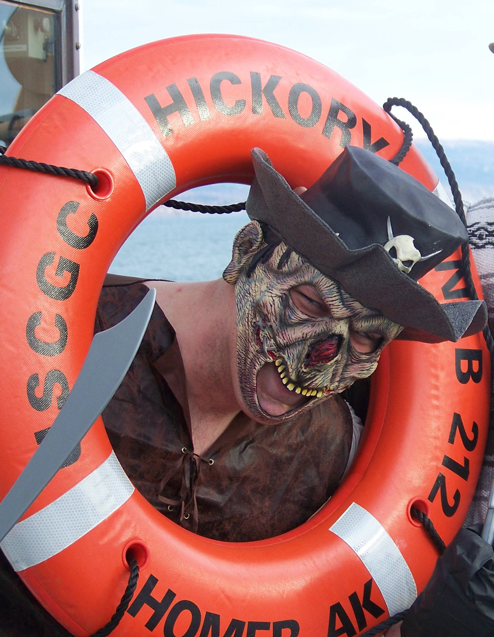 Ghoulies, goblins and monsters from the USCGC Hickory, including Colby Schlaht, left, and Jason Pratt, prepared for a hair-raising shipboard haunting in October 2012. Every year the crew of the Haunted Hickory decorates the ship for a night of good natured scary fun. (Homer News file photo)