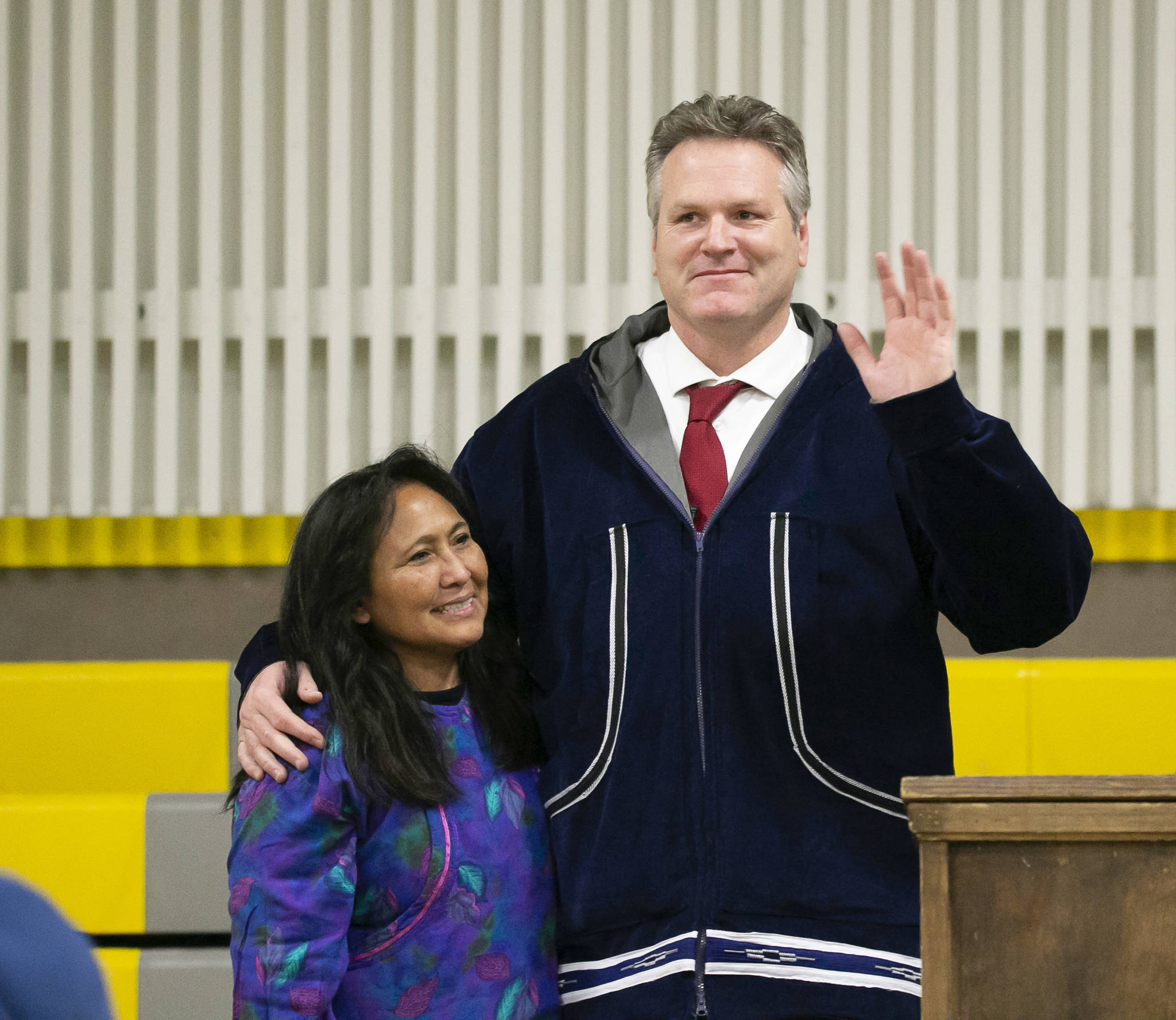 In this Dec. 3, 2018, file photo, Alaska Gov. Mike Dunleavy poses with first lady Rose Dunleavy after he was sworn into office in Kotzebue, Alaska. Alaska’s new governor is heading into his first legislative session, where he’ll try to implement campaign promises on some politically thorny issue. (Stanley Wright/Alaska Governor’s Office via AP, file)