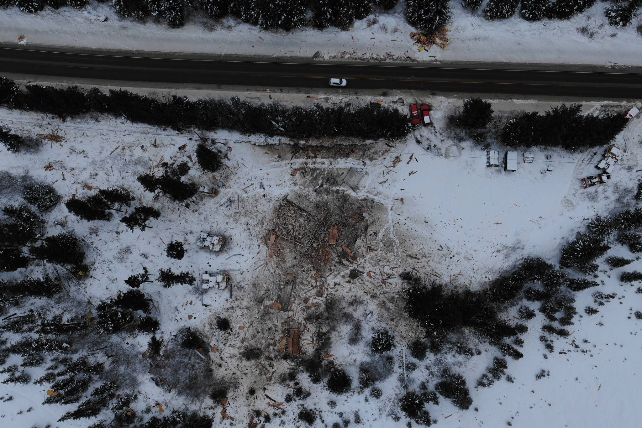 An aerial drone photo shows the extent of the explosion of a house that blew up on Dec. 27, 2018, near Mile 166 Sterling Highway in Homer, Alaska. (Photo by Travis Ogden/Kachemak Emergency Services)