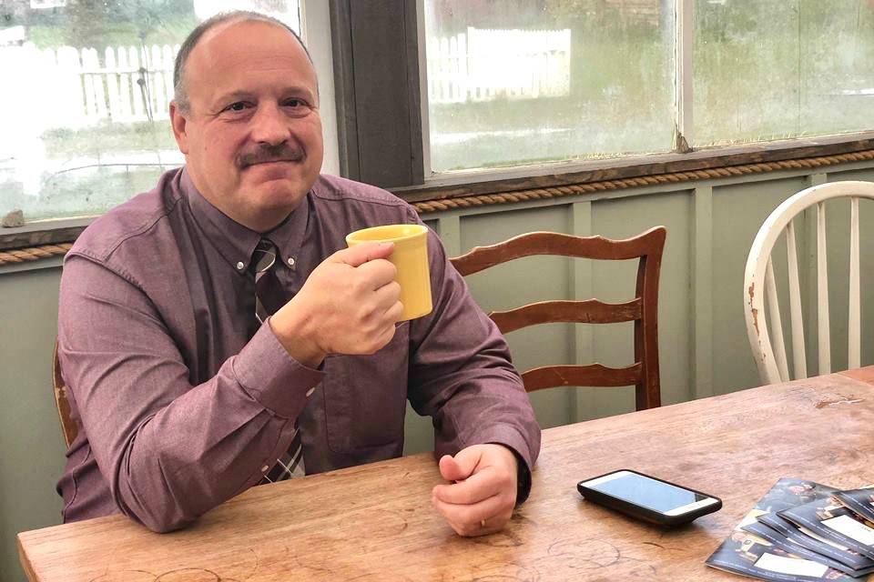Kenai Peninsula Borough School District Superintendent Sean Dusek waits to talk and answer the public’s questions in the back room of Veronica’s Cafe in Kenai. (Peninsula Clarion file photo)