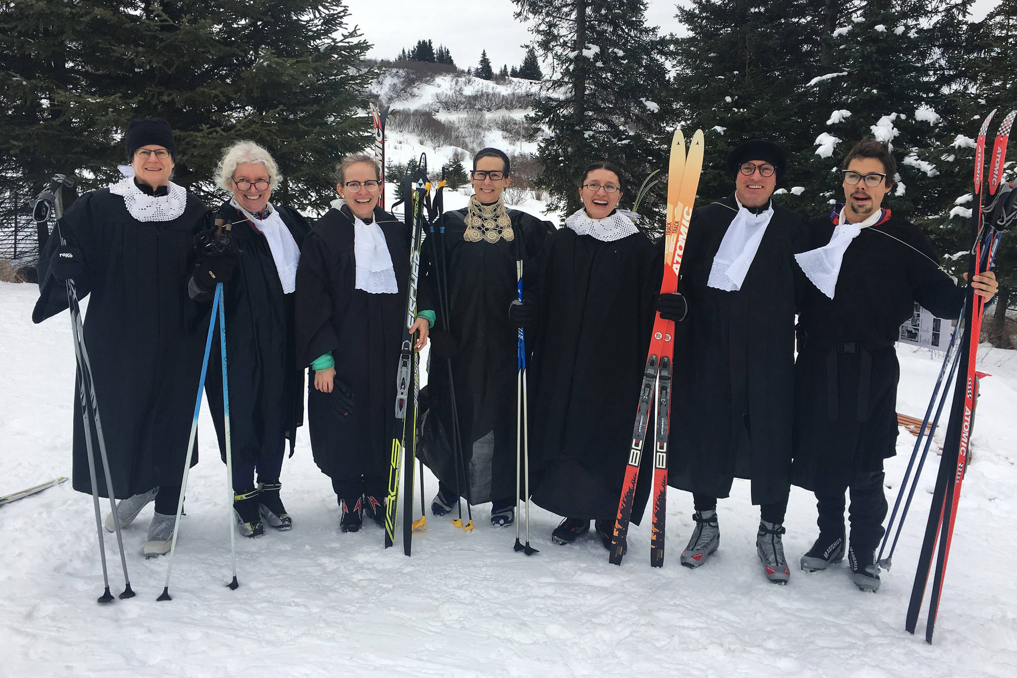 A gaggle of Ruth Bader Ginsburgs pose to show off their group costume before the annual Ski for Women on Sunday, Feb. 3, 2019 at the Lookout Mountain Trails near Homer, Alaska. (Photo by Megan Pacer/Homer News)