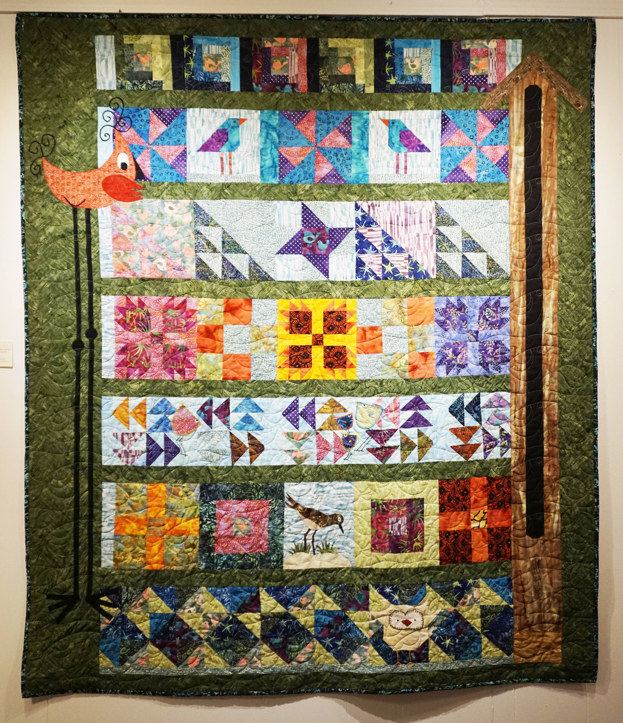 Janet Bacher’s “Birds in Flight” quilt, one of the works in the “9 Women / 9 Quilts” show that opened last Friday, Feb. 1, 2019, at the Homer Council on the Arts, in Homer, Alaska. (Photo by Michael Armstrong/Homer News)