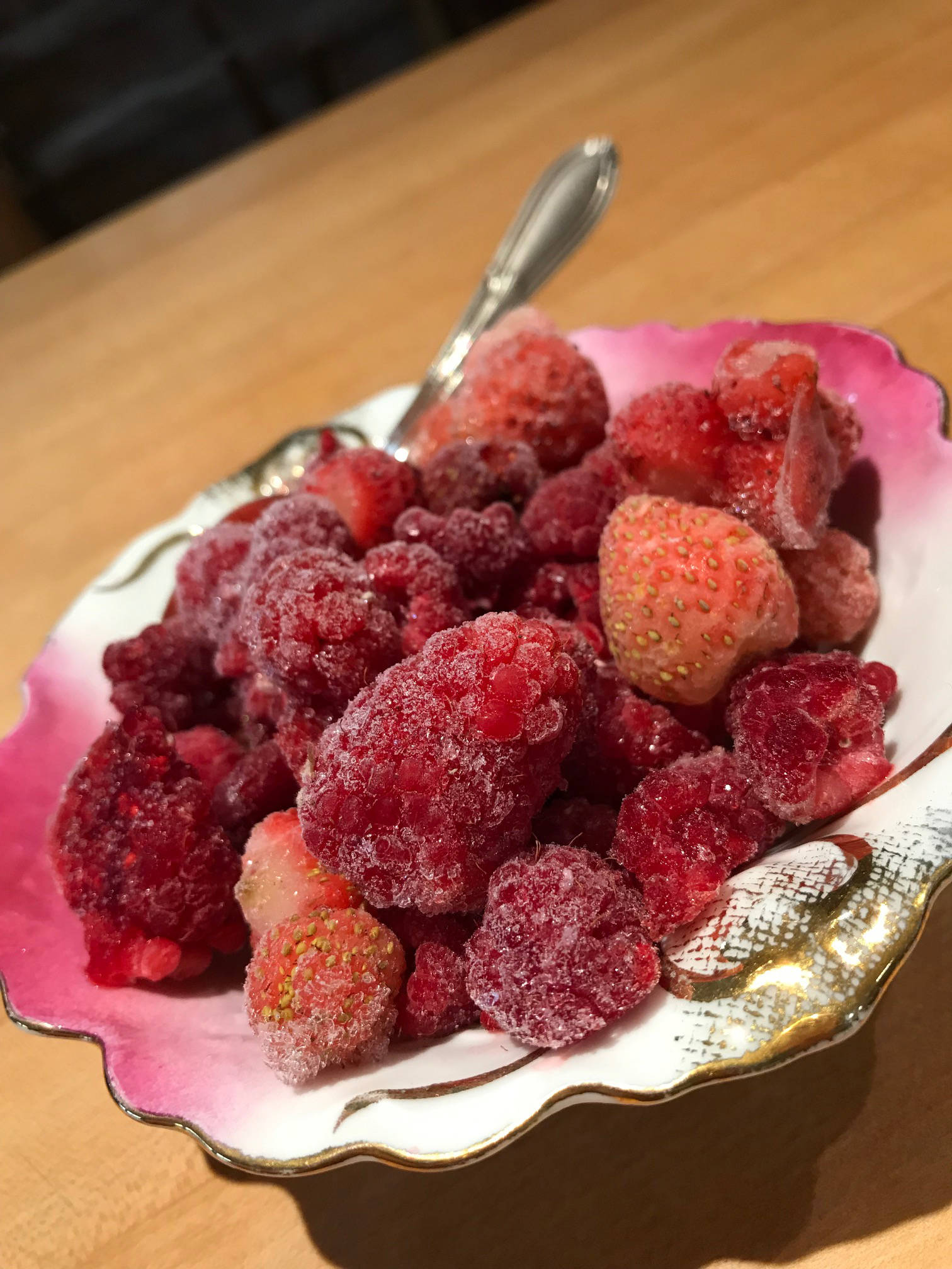 Strawberries and raspberries picked at their peak of perfection, popped into the freezer to be savored throughout the long, dark winter months. What better reason to garden? (Photo by Cecilia Fitzpatrick)