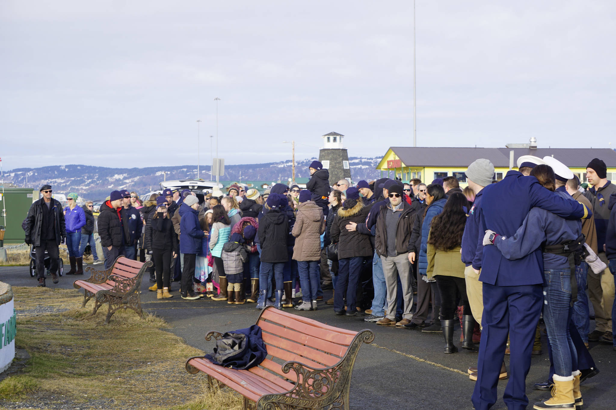 Friends and crew mates of Chief Warrant Officer Michael Kozloski meet after a memorial service for him on Friday morning, Feb. 8, 2019, at the Seafarer’s Memorial on the Homer Spit, Homer, Alaska. (Photo by Michael Armstrong/Homer News)