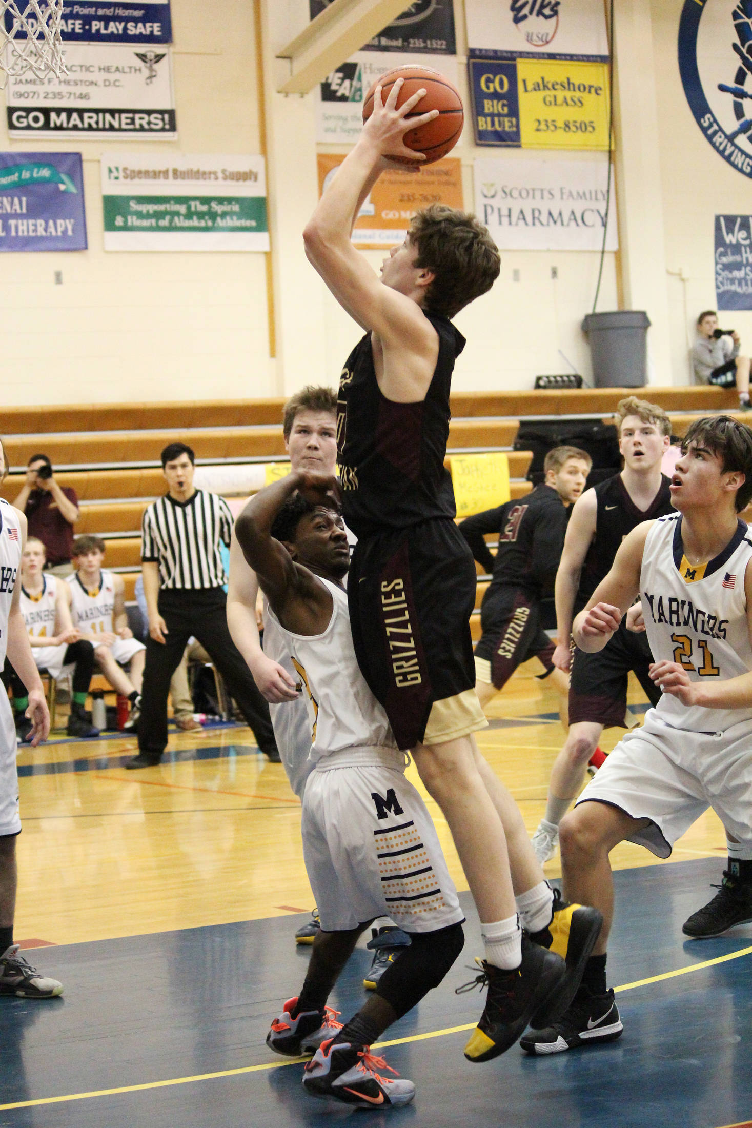 Nathan Ivanoff of Grace Christian School takes a shot at the Homer basket during a Friday, Feb. 22, 2019 game in Homer, Alaska. (Photo by Megan Pacer/Homer News)