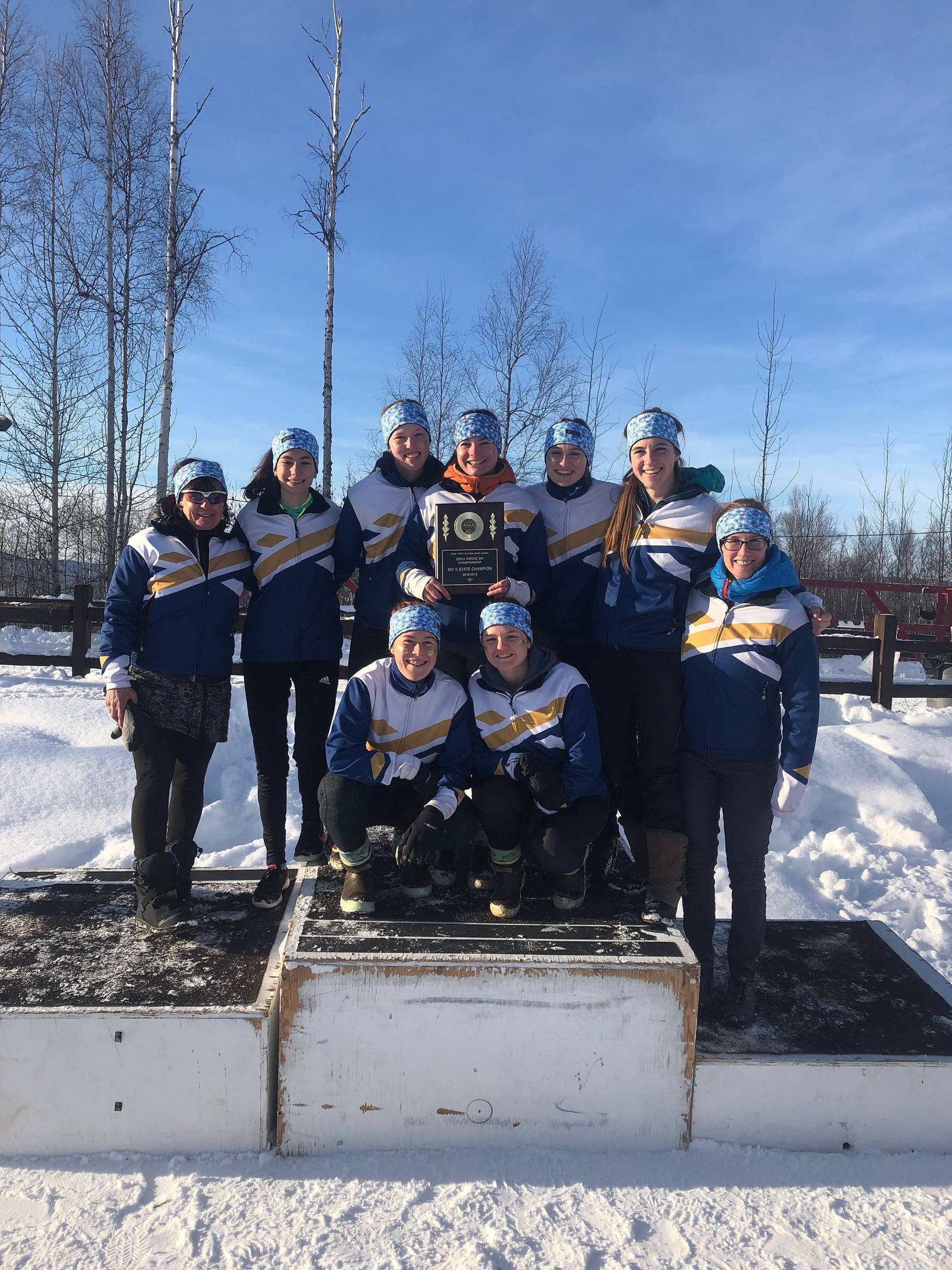 Members of the Homer girls cross-country ski team pose with their first place award for the small schools division for the state skiing championship meet held in Fairbanks, Alaska the weekend of Feb. 22-23, 2019. (Photo courtesy Alison O’Hara)