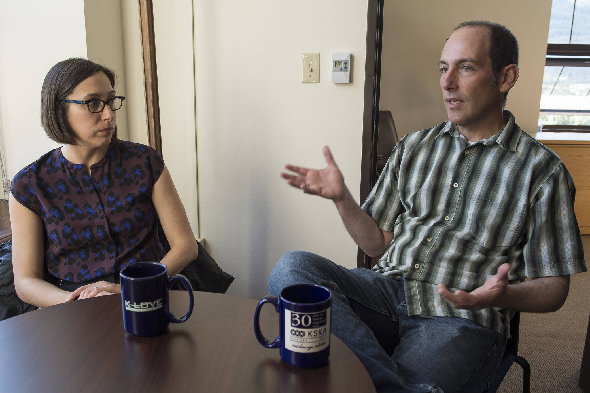 Nikoosh Carlo, left, and Michael LeVine, members of Gov. Bill Walker’s climate change task force, talk about upcoming recommendations on Thursday, Sept. 6, 2018. (Michael Penn | Juneau Empire File)
