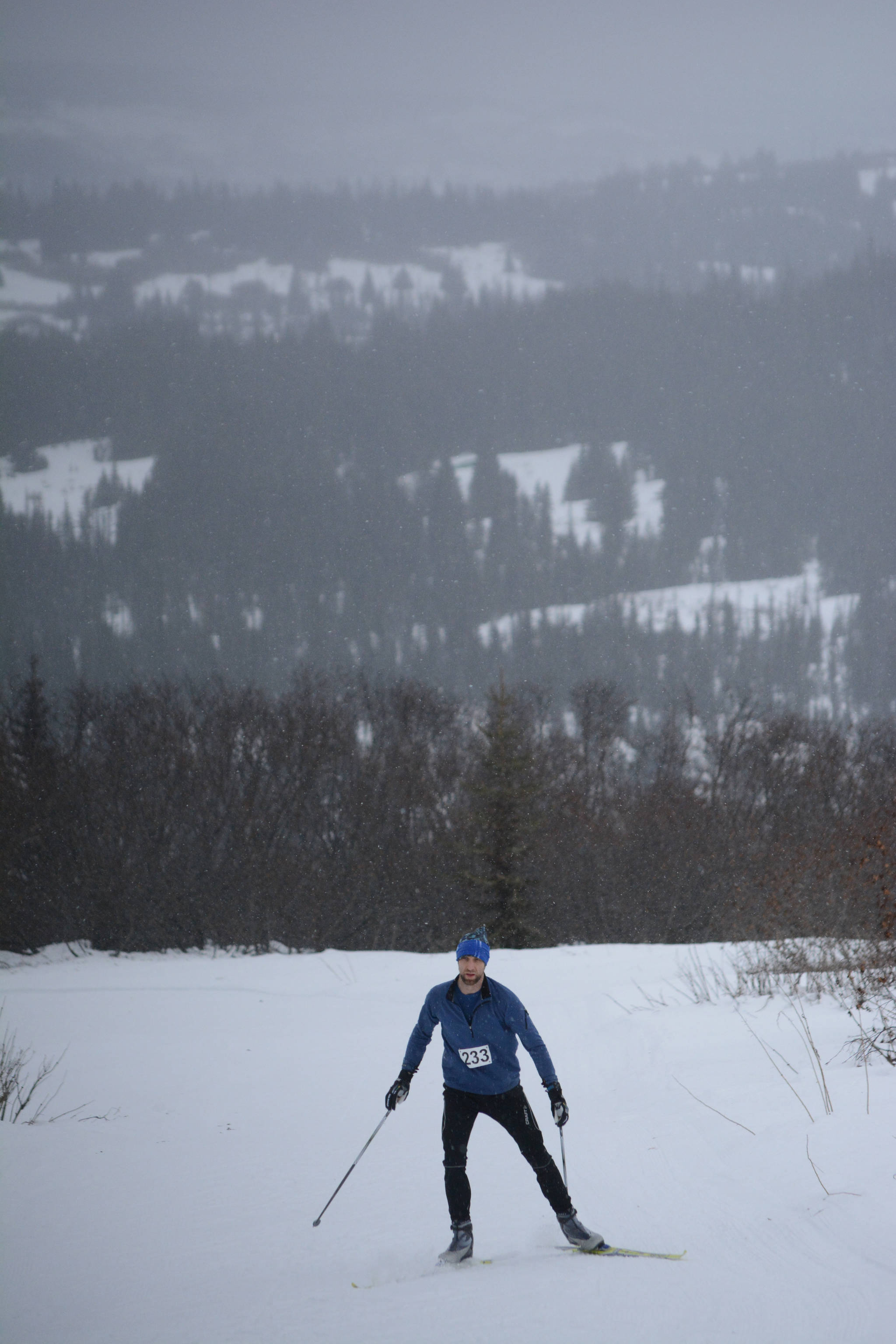 Garrett Yager of Anchorage comes up the Diamond Ridge hill in the Kachemak Nordic Ski Marathon on March 11, 2017, near Homer, Alaska. (Photo by Michael Armstrong/Homer News)