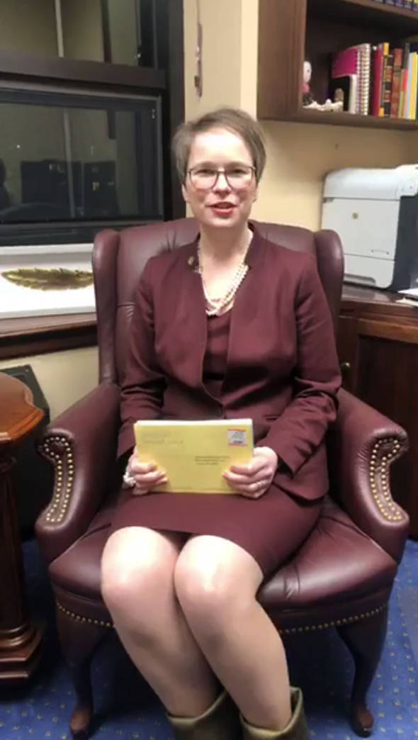 Rep. Sarah Vance, R-Homer, holds a batch of postcards from Homer High School students in this screenshot of a video she made for her Facebook page on the evening of March 7, 2019, from her office in Juneau. Vance later removed the video.