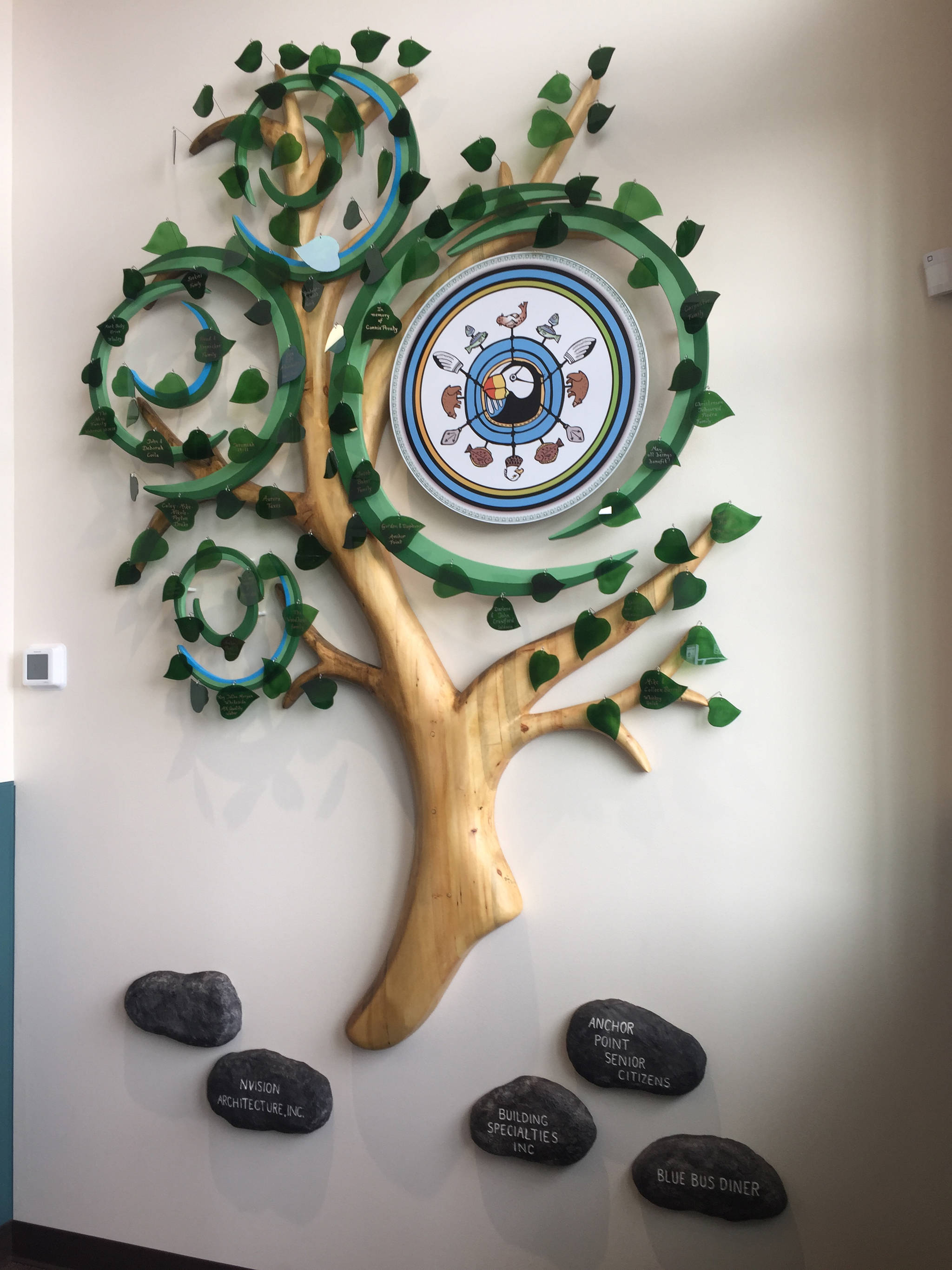 The Anchor Point Family Tree, crafted by Ben Firth of Ben Firth Studio, is the first thing visitors to the new health center see as they walk through the front door. (Photo by Delcenia Cosman)