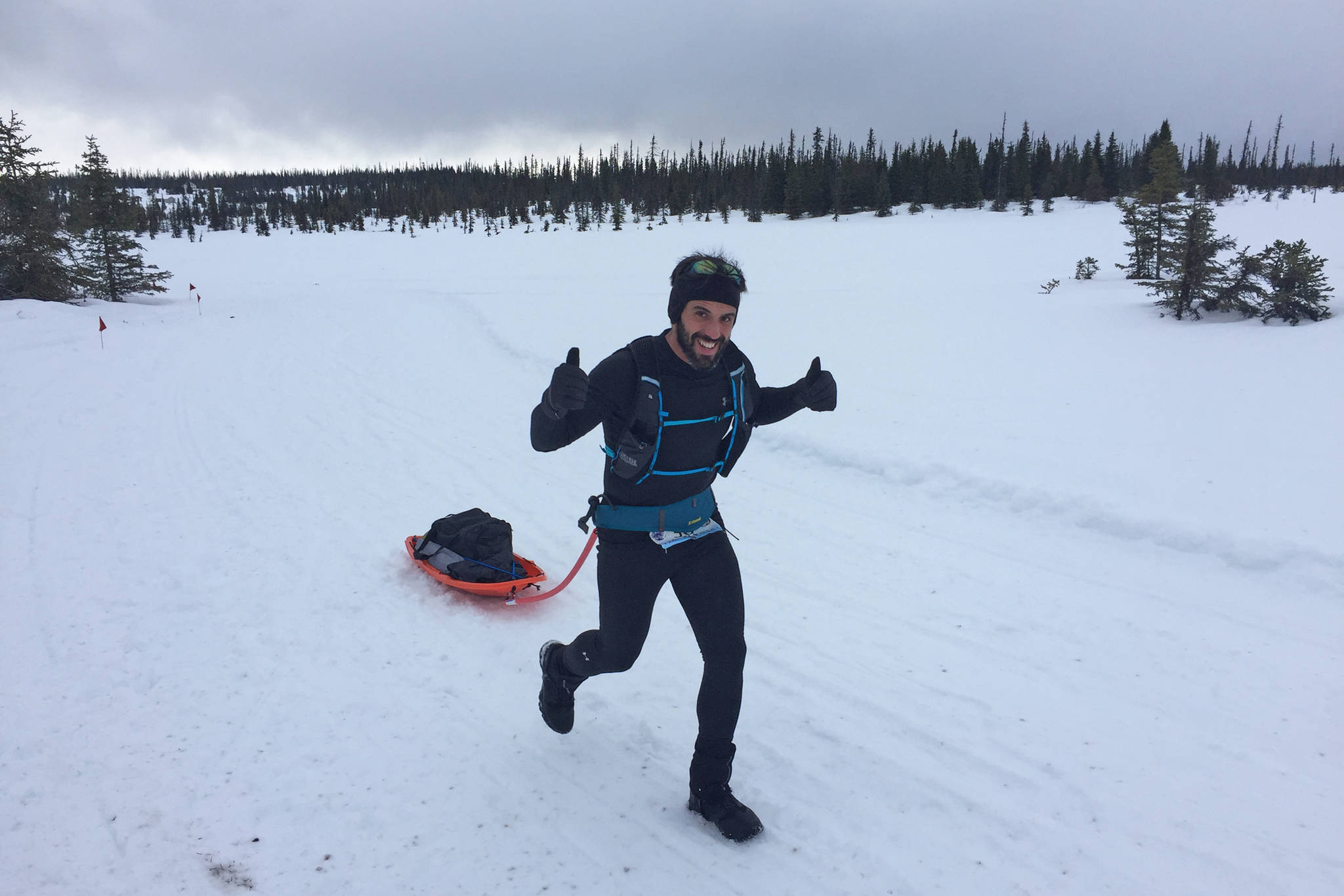 A participant in the annual Homer Epic completes the race through the Caribou Hills on foot Saturday, March 16, 2019 near Homer, Alaska. (Photo courtesy Chuck Lindsay)