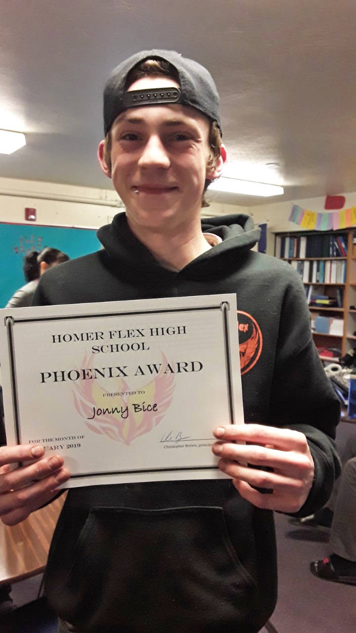 Jonny Bice-Dee, a junior at Homer Flex School, holds his Phoenix award in this undated photo at the school in Homer, Alaska. (Photo courtesy Ingrid Harrald)