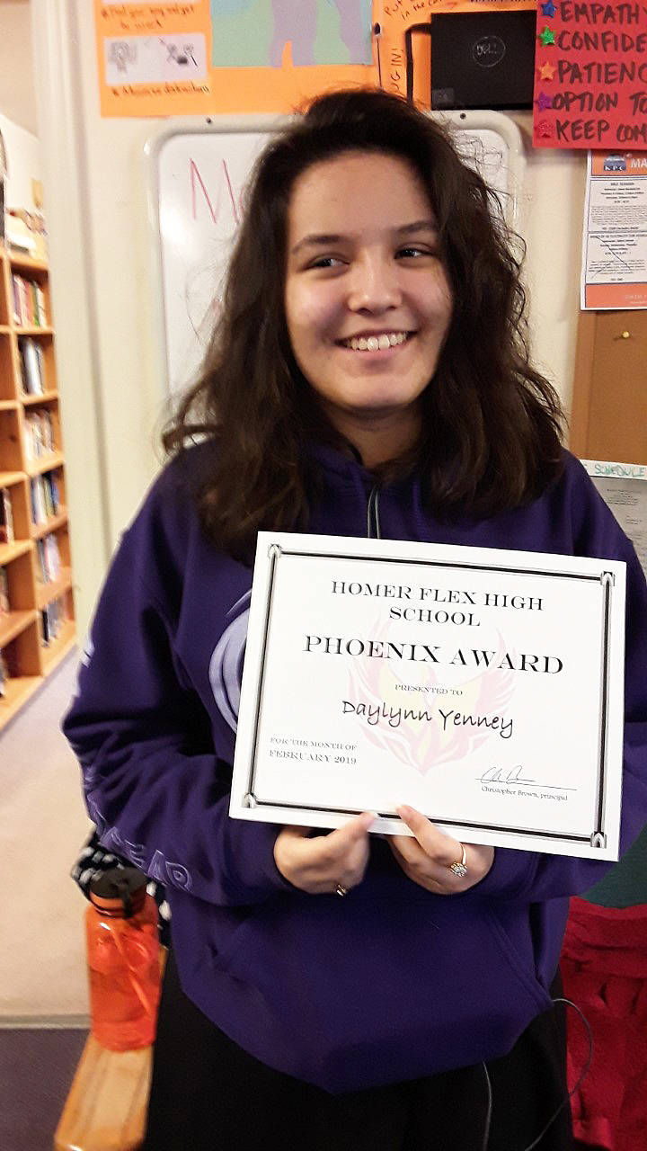 Daylynn Yenny, a junior at Homer Flex School, holds her Phoenix award in this undated photo at the school in Homer, Alaska. (Photo courtesy Ingrid Harrald)