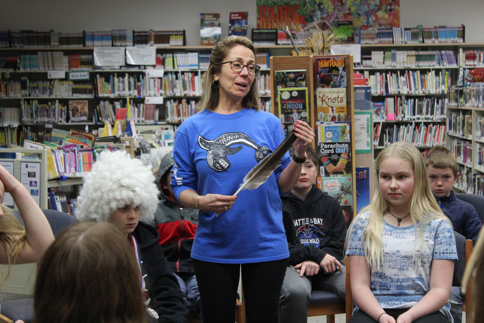 West Homer Elementary School teacher Becky Paul explains the use of a feather used by whoever’s turn it is to speak before a group a fifth and sixth grade students perform a demonstration of restorative justice on March 22, 2019 at the School in Homer, Alaska. This is a new aspect of Homer’s Youth Court program that focuses on getting restorative justice practices into local schools. (Photo by Megan Pacer/Homer News)
