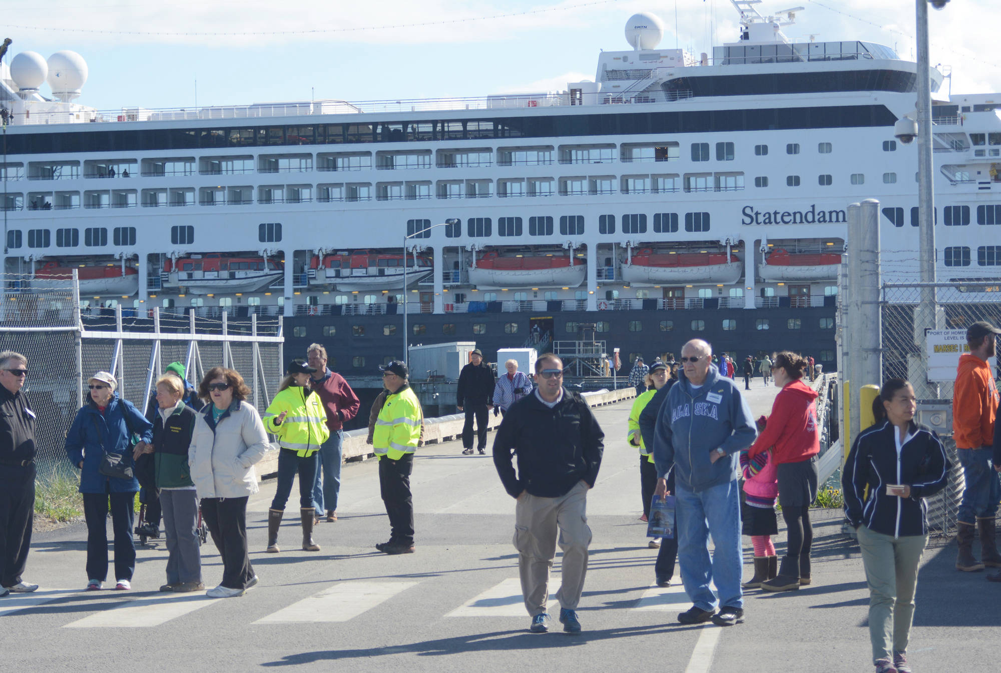 Passengers disembark from the M/V Statendam in May 2015 after the Holland America cruise ship arrived, the first of the season. (Photo by Michael Armstrong/Homer News)