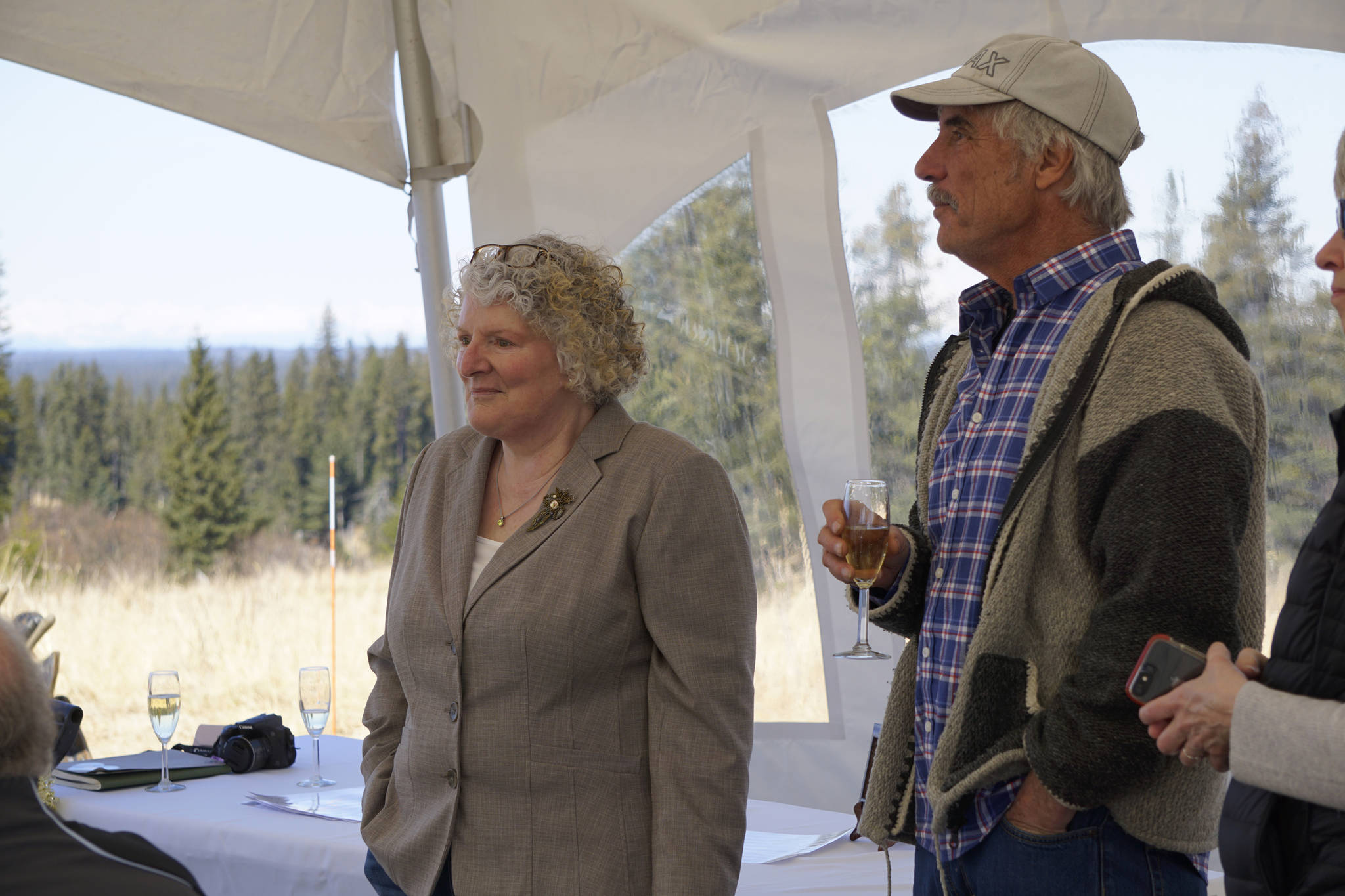 Homer writer and Storyknife Writers Retreat founder Dana Stabenow stands with contractor Scott Bauer at groundbreaking ceremonies last Saturday, May 4, 2019, at the retreat property in Homer, Alaska. Construction started this month on the main house and cabins that will in a year house visiting women writers. (Photo by Michael Armstrong/Homer News)
