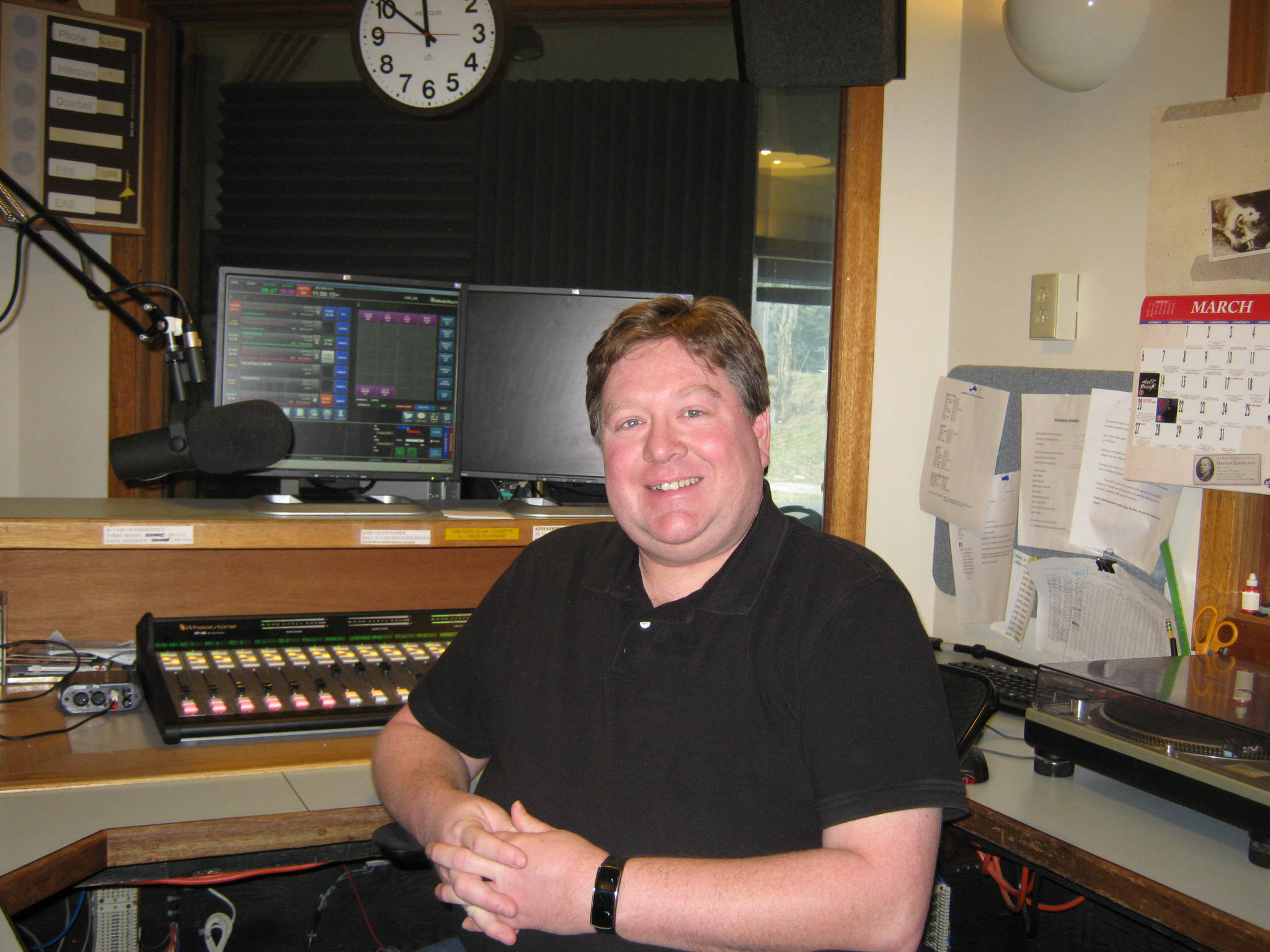 Terry Rensel poses in the KBBI studios in this 2016 photo in Homer, Alaska. (Photo provided)