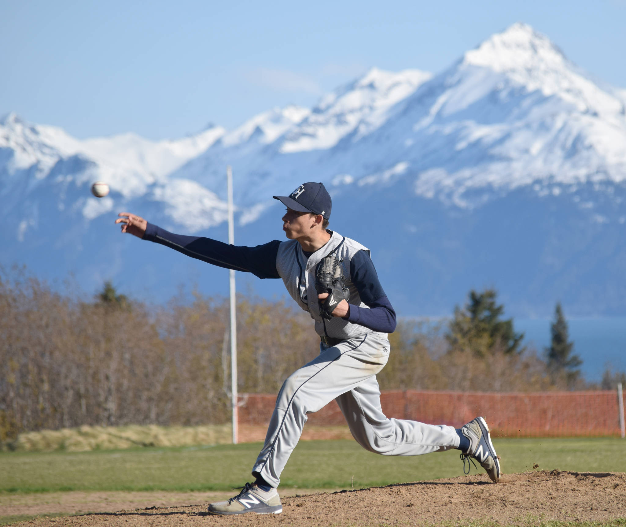 Soldotna pitcher Chris Jaime delivers against Homer on Tuesday, May 8, 2019, at Homer High School in Homer, Alaska. (Photo by Jeff Helminiak/Peninsula Clarion)