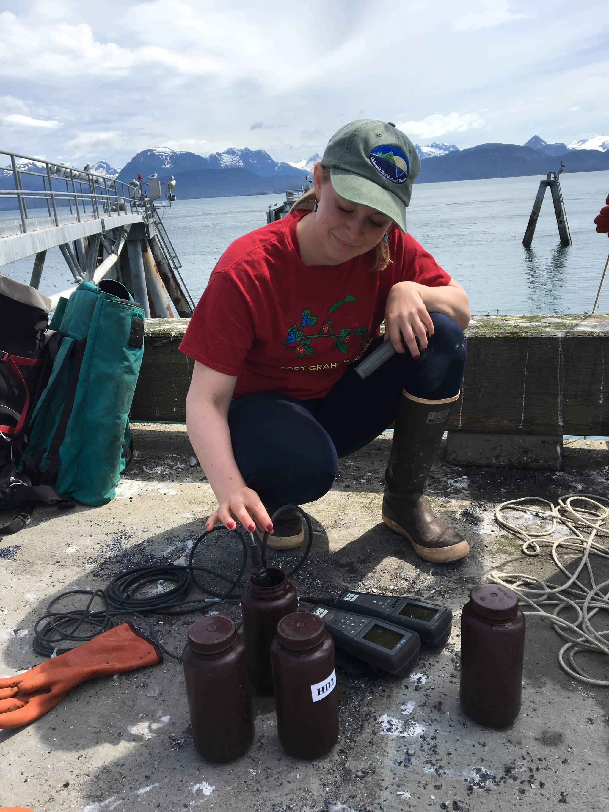 Harmful species coordinator Rosie Masui takes samples at the Homer Harbor in July 2017 in Homer, Alaska. (Photo provided)