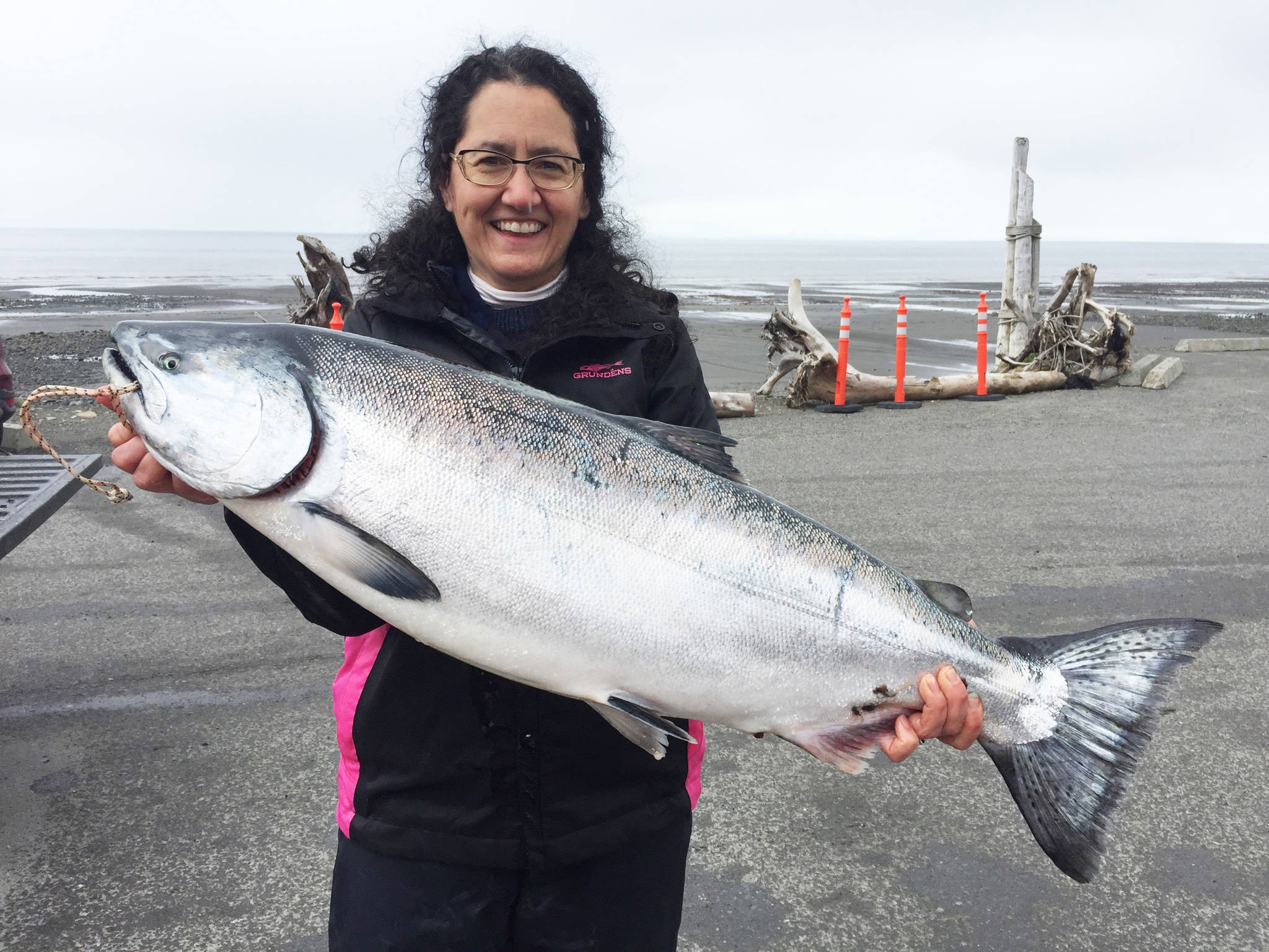 Derotha Ferraro from the fishing vessel Big Game poses with the king salmon she caught at the Anchor Point King Salmon Calcutta on Sunday, May 12, 2019, in Anchor Point, Alaska. Ferraro’s fish was one of the top ten fish caught in the tournament, weighing more than 20 pounds. (Photo courtesy of Bill Scott)