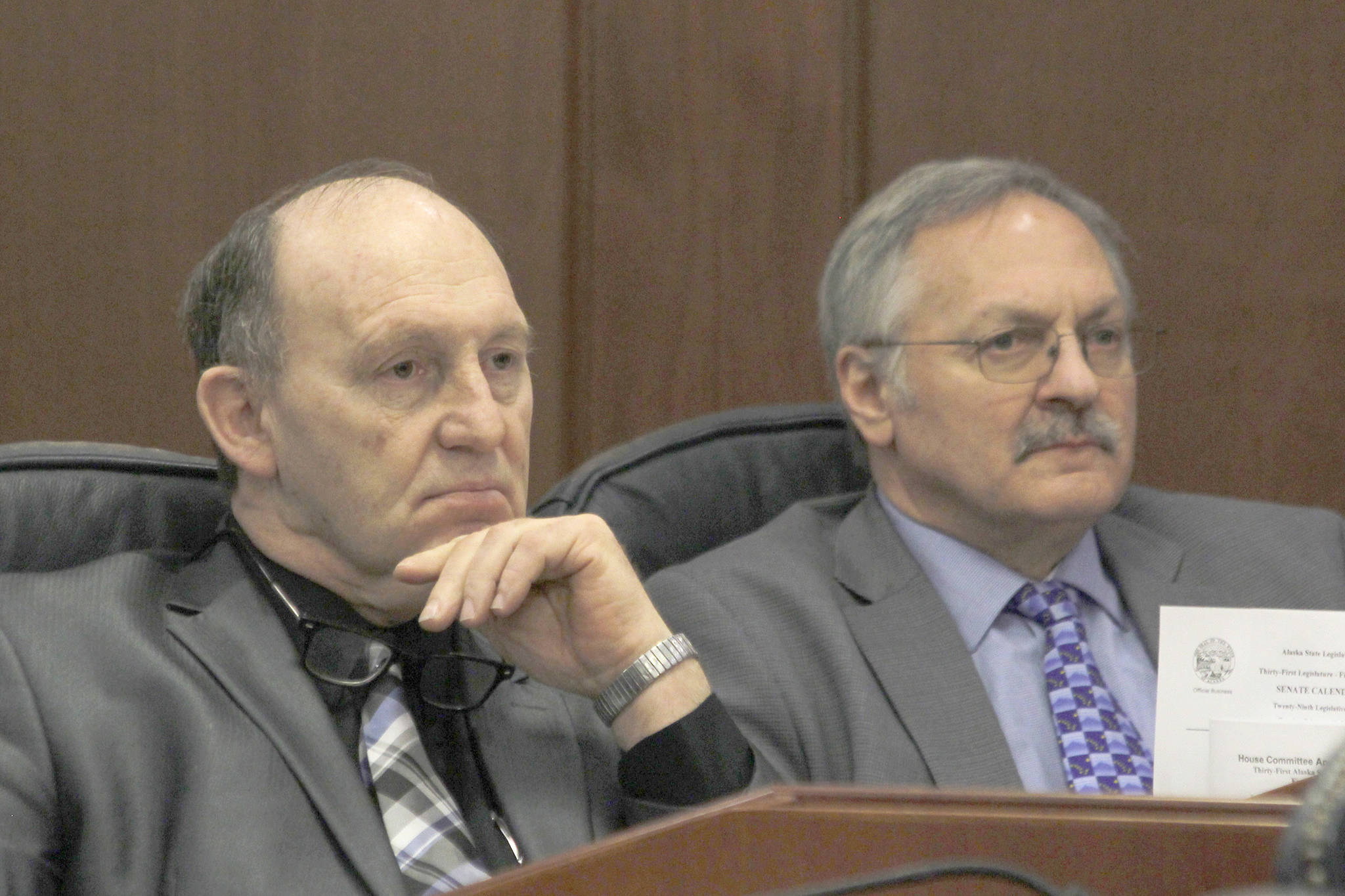 Rep. Gary Knopp, R-Kenai/Soldotna, and Rep. Dave Talerico, R-Healy, sit next to each other after Knopp voted not to confirm Talerico as Speaker of the House on Feb. 5. (Alex McCarthy | Juneau Empire)
