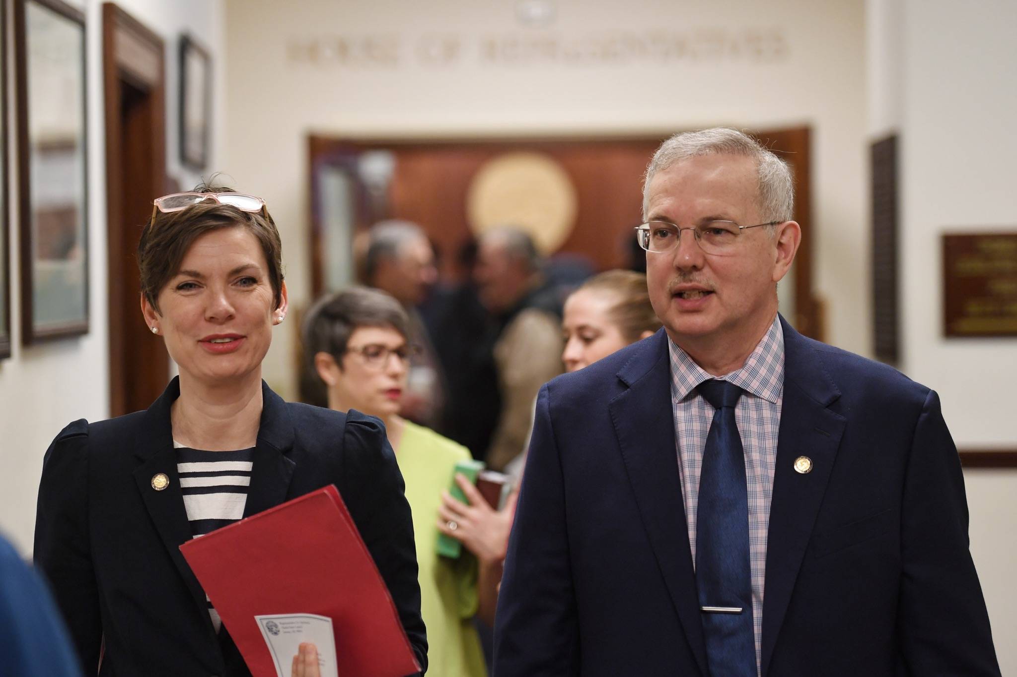 Rep. Ivy Spohnholz, D-Anchorage, walks with Speaker of the House Bryce Edgmon, I-Dillingham, as the House takes an at ease to wait for the conference committee on the crime bill to take place at the Capitol on Thursday, May 16, 2019. (Michael Penn | Juneau Empire)