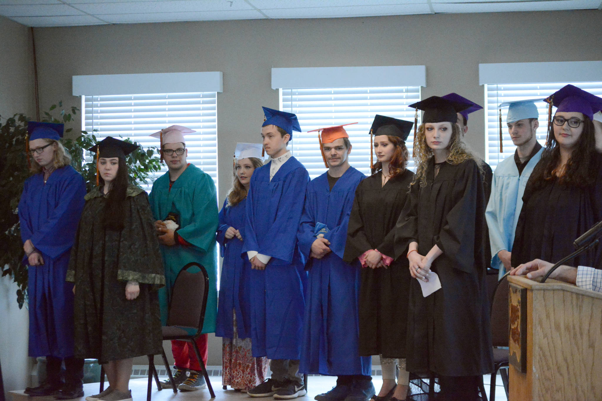 Flex School graduates stand before the start of graduation ceremonies on Wednesday, May 22, 2019, at Land’s End Resort in Homer, Alaska. (Photo by Michael Armstrong/Homer News)