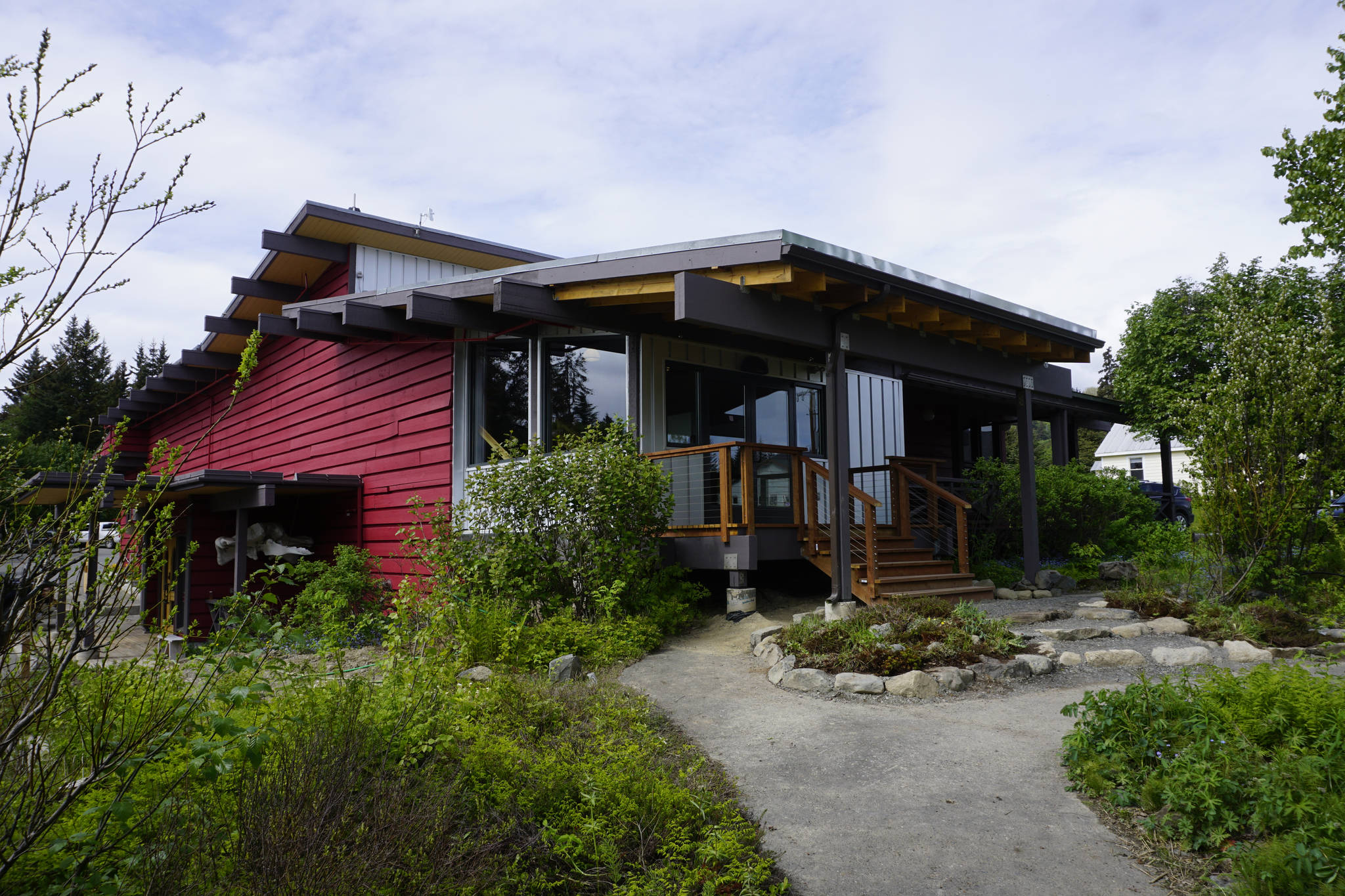 The remodeled Pratt Museum, as seen on May 25, 2019, in Homer, Alaska. The front entrance has been redone, adding some extra space and new steps. Handicap accessibility is to the right of the new entrance through the old porch. (Photo by Michael Armstrong/Homer News)
