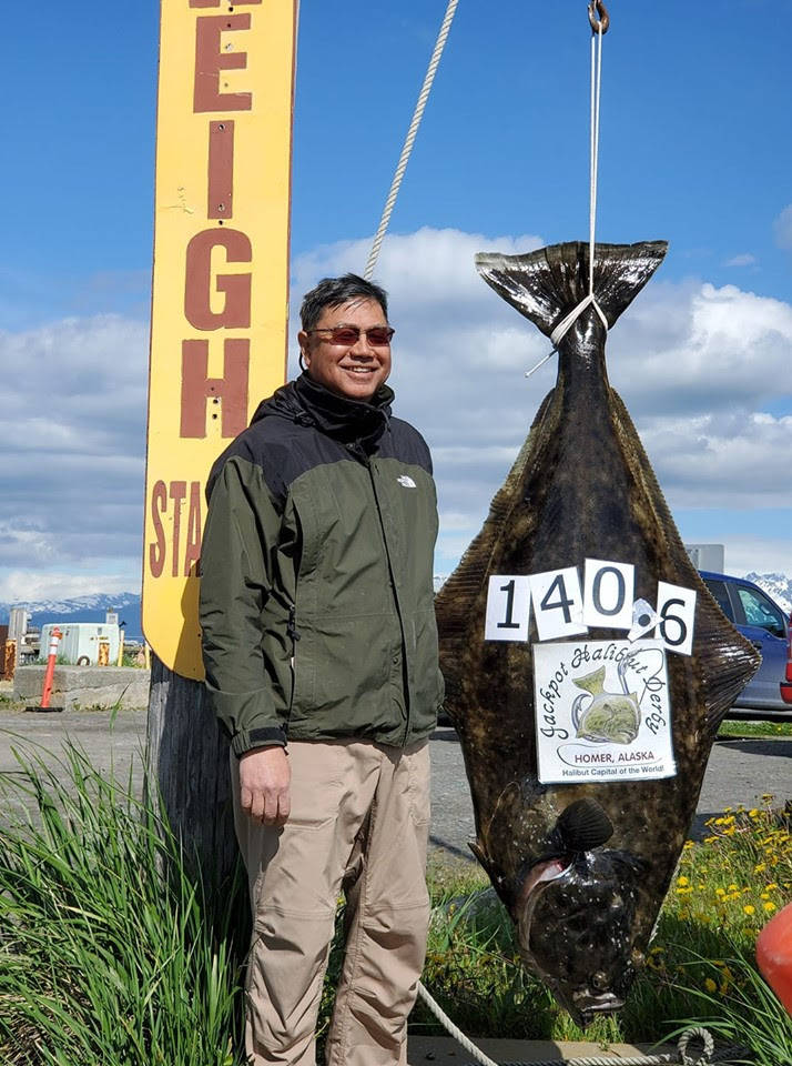 New Homer Chamber of Commerce and Visitor Center Jackpot Halibut Derby leader David Hosang from Bedford, New Hampshire, poses in this undated photo with his 140.6-pound halibut caught while fishing with Bob’s Trophy Charters on the Sea Predator with Captain Cory Decook near Homer, Alaska. (Photo courtesy Homer Chamber of Commerce)