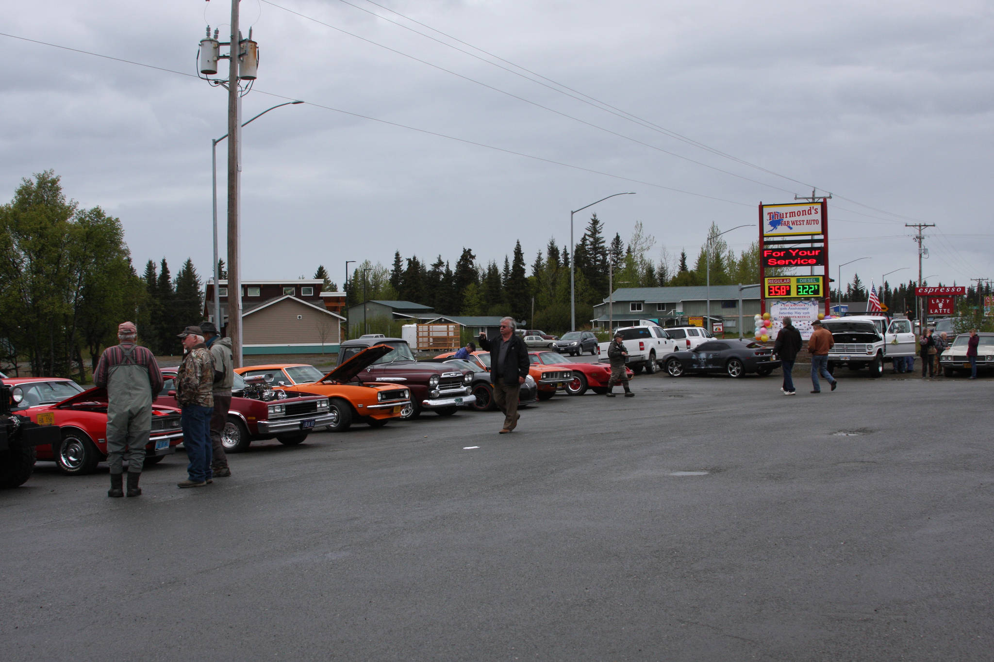 Classic cars brought in by members of the Kaknu Kruzer Car Club of Alaska line up in the parking lot at Thurmond’s Far West Auto in Anchor Point, Alaska, on Saturday, May 25. (Photo by Delcenia Cosman)