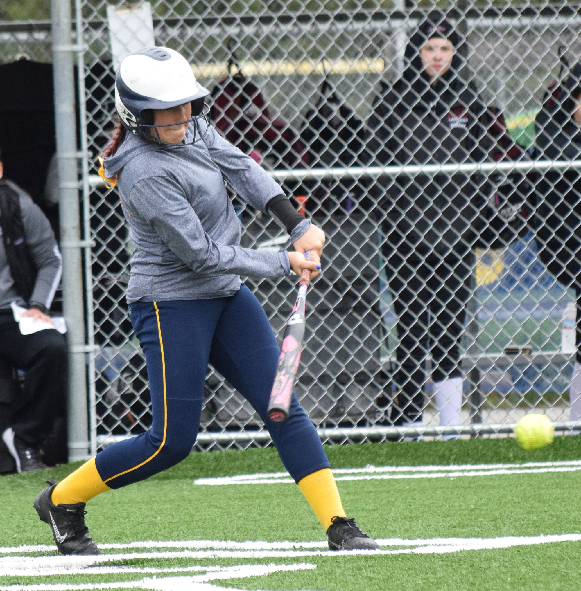 Homer’s Haylee Owen takes a swing at a pitch from Ketchikan at the Division II state softball tournament Saturday, June 1, 2019, at Cartee Fields in Anchorage, Alaska. (Photo by Joey Klecka/Peninsula Clarion)