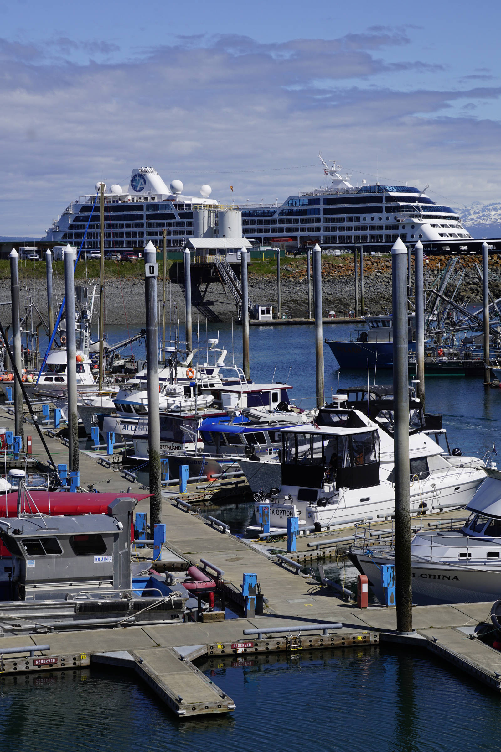 The Azmara Quest looms over the Homer Harbor on Friday, May 24, 2019, in Homer, Alaska. The ship was one of two cruise ships to dock in Homer over the Memorial Day weekend, with the Silver Muse visiting on Sunday, May 26. A planned visit by the USS John Finn on May 27 had to be canceled when the Arleigh-Burke class destroyer was diverted for operational reasons. (Photo by Michael Armstrong/Homer News)