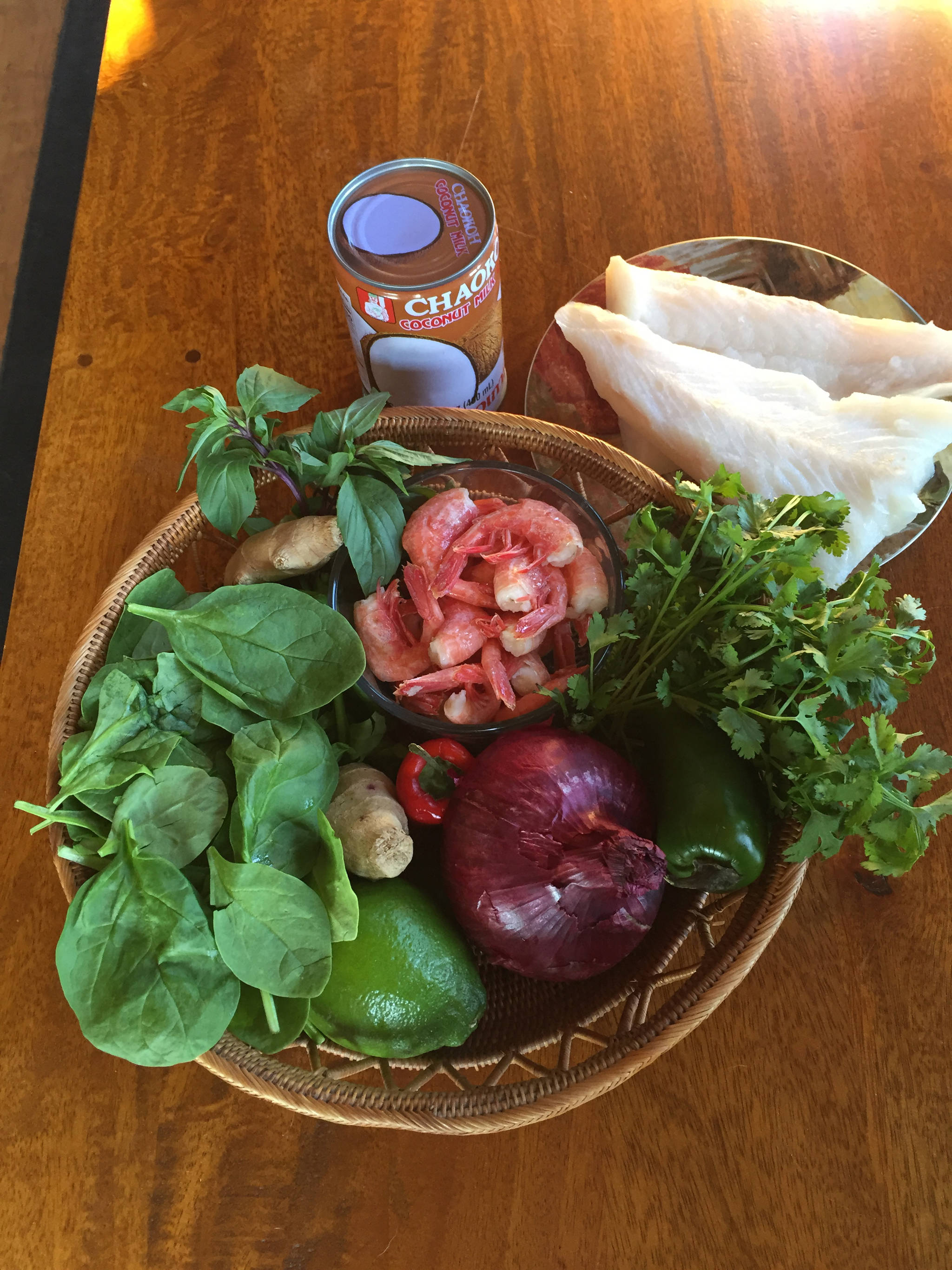 Some assembly is required: The ingredients for Teri Robl’s version of Cocount Miso Seafood Curry include fresh shrimp and halibut, as seen here in her Homer, Alaska, kitchen on June 10, 2019. (Photo by Teri Robl)