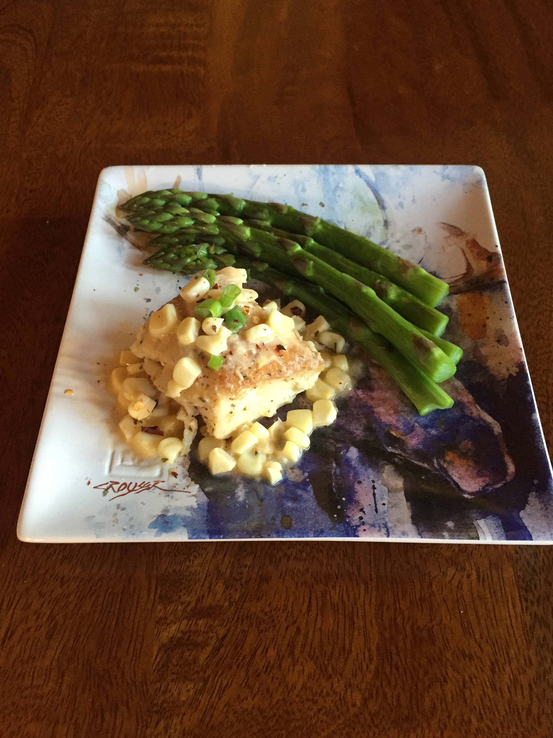 Corn in this recipe of roasted halibut with corn chardonnay butter sauce complements the taste of halibut, as prepared here on June 25, 2019, in Teri Robl’s kitchen in Homer, Alaska. (Photo by Teri Robl)