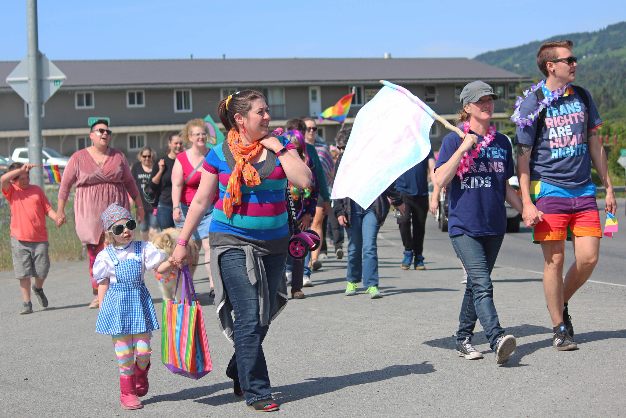 Participant’s in Homer’s second Pride Walk make their way up Ocean Drive on Saturday, June 22, 2019 in Homer, Alaska. (Photo by Megan Pacer/Homer News)