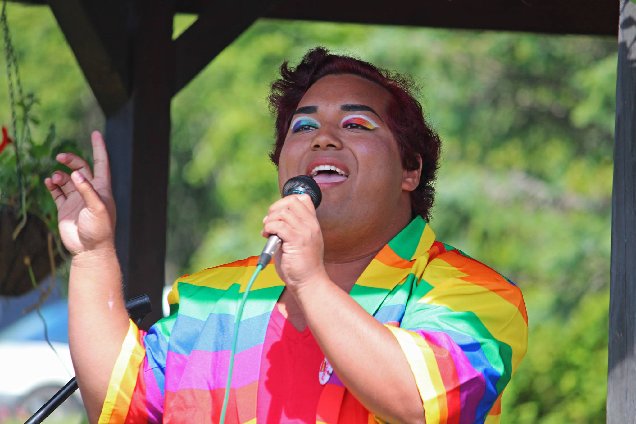 Homer High School graduate Falcom Greear performs a song ahead of this year’s Pride Walk on Saturday, June 22, 2019 at WKFL Park in Homer, Alaska. (Photo by Megan Pacer/Homer News)
