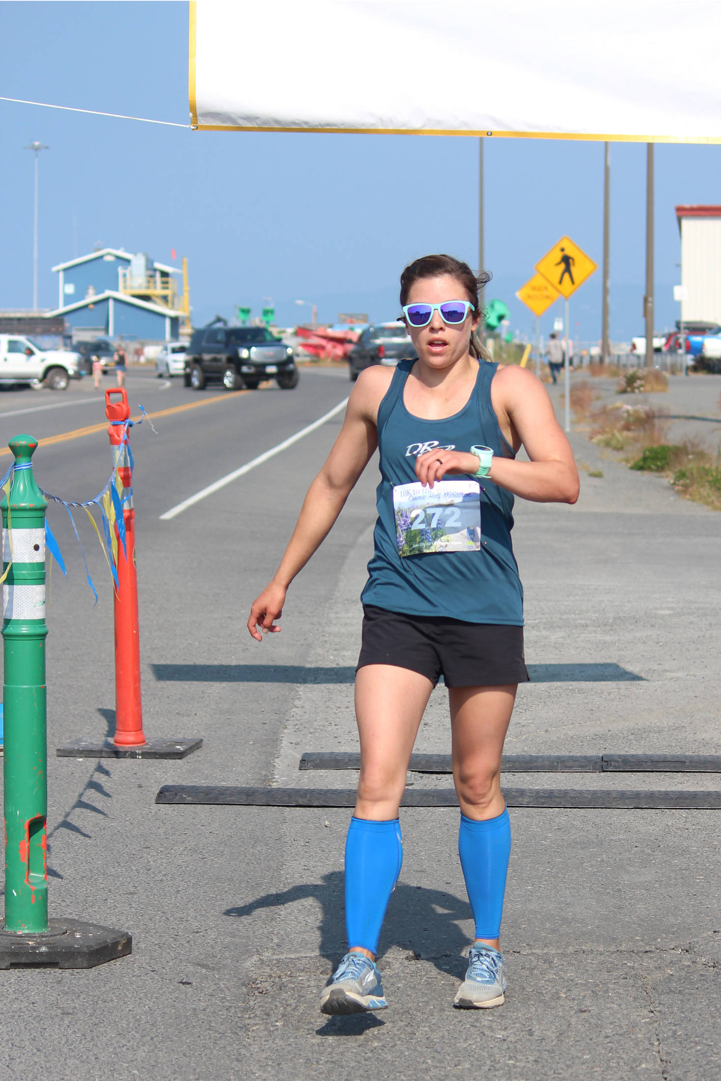 Kristyn Turney of Anchorage takes first place for the women in the Spit Run 10k to the Bay on Saturday, June 29, 2019 in Homer, Alaska. (Photo by Megan Pacer/Homer News)