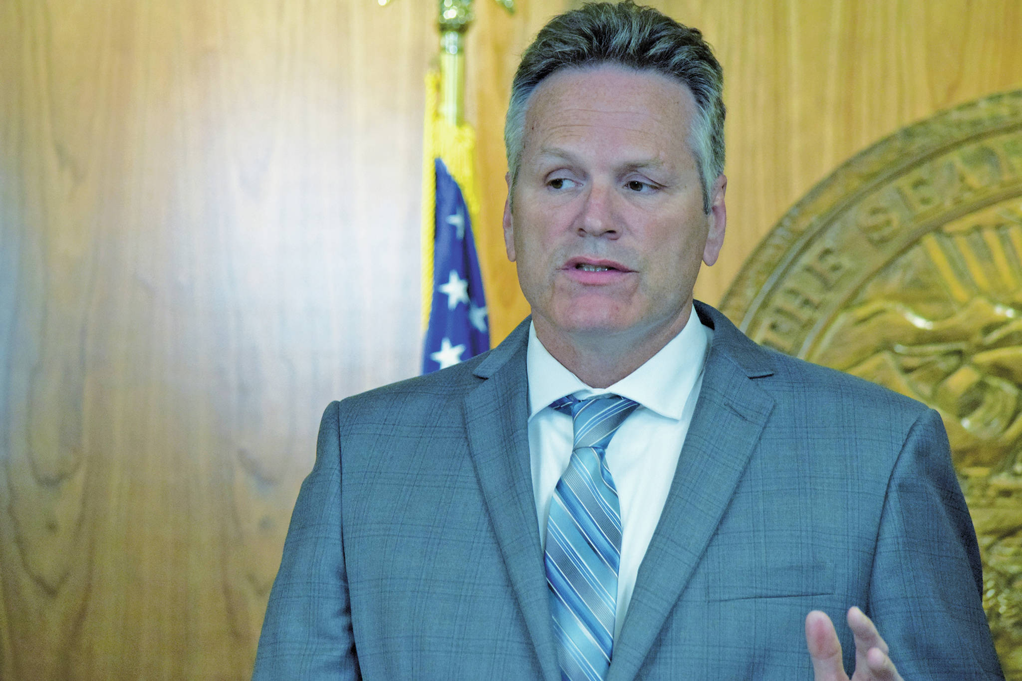 Photo by Ben Hohenstatt/Juneau Empire                                Gov. Mike Dunleavy speaks during a press conference to announce more than $400 million in line-item vetoes to the Legislature-approve budget, Friday, June 28, 2019.