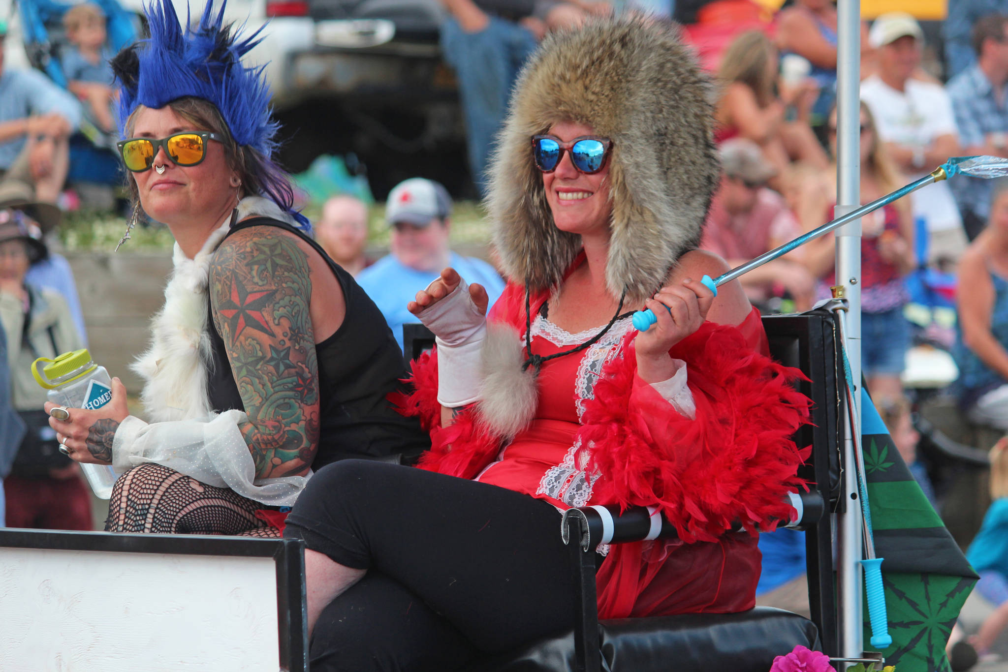 Participants in this year’s July Fourth parade hosted by the Homer Chamber of Commerce ride in a float on Thursday, July 4, 2019 down Pioneer Avenue in Homer, Alaska. (Photo by Megan Pacer/Homer News)