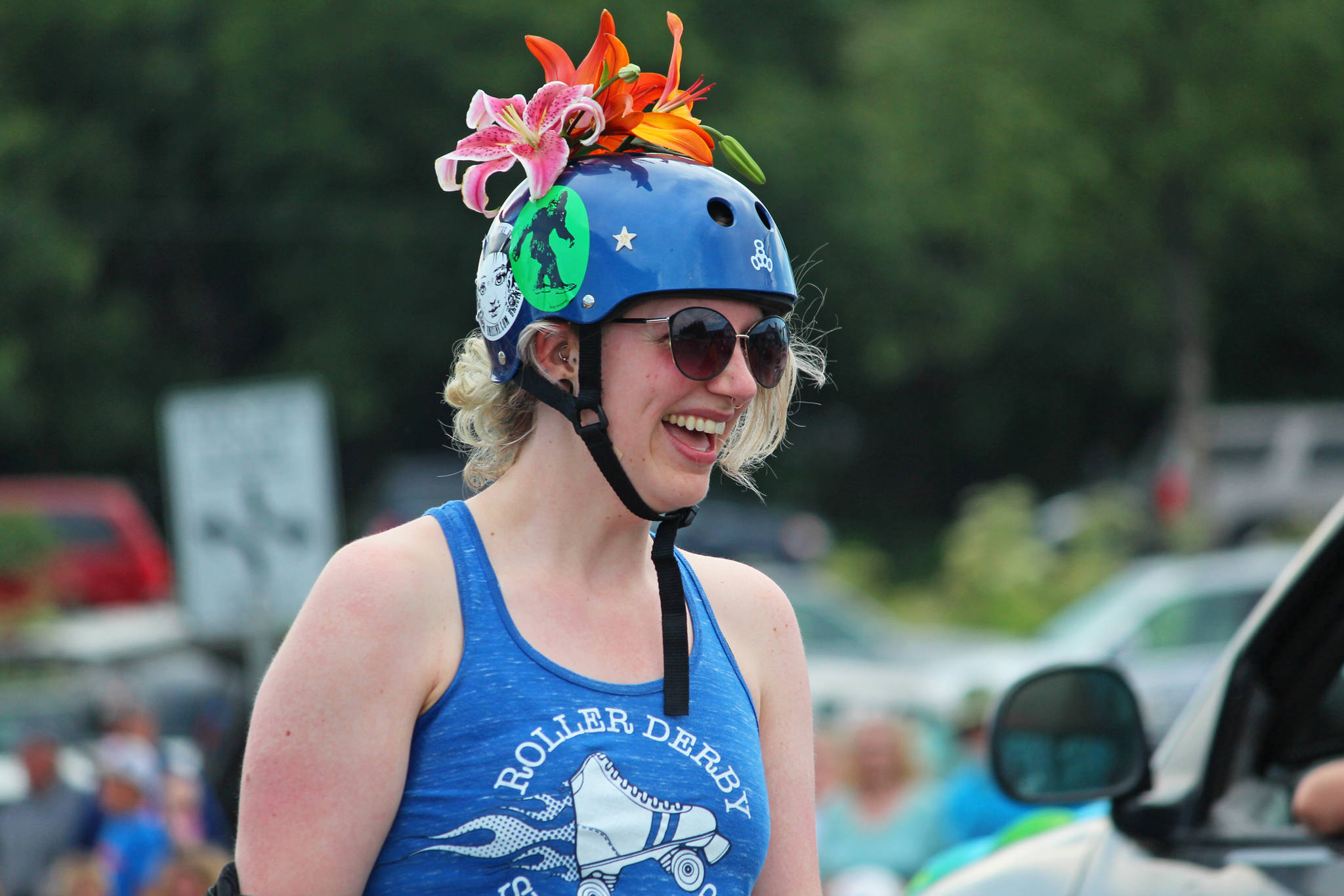 A member of the Spit City Sirens roller derby team skates through this year’s July Fourth parade, hosted by the Homer Chamber of Commerce, on Thursday, July 4, 2019 on Pioneer Avenue in Homer, Alaska. (Photo by Megan Pacer/Homer News)