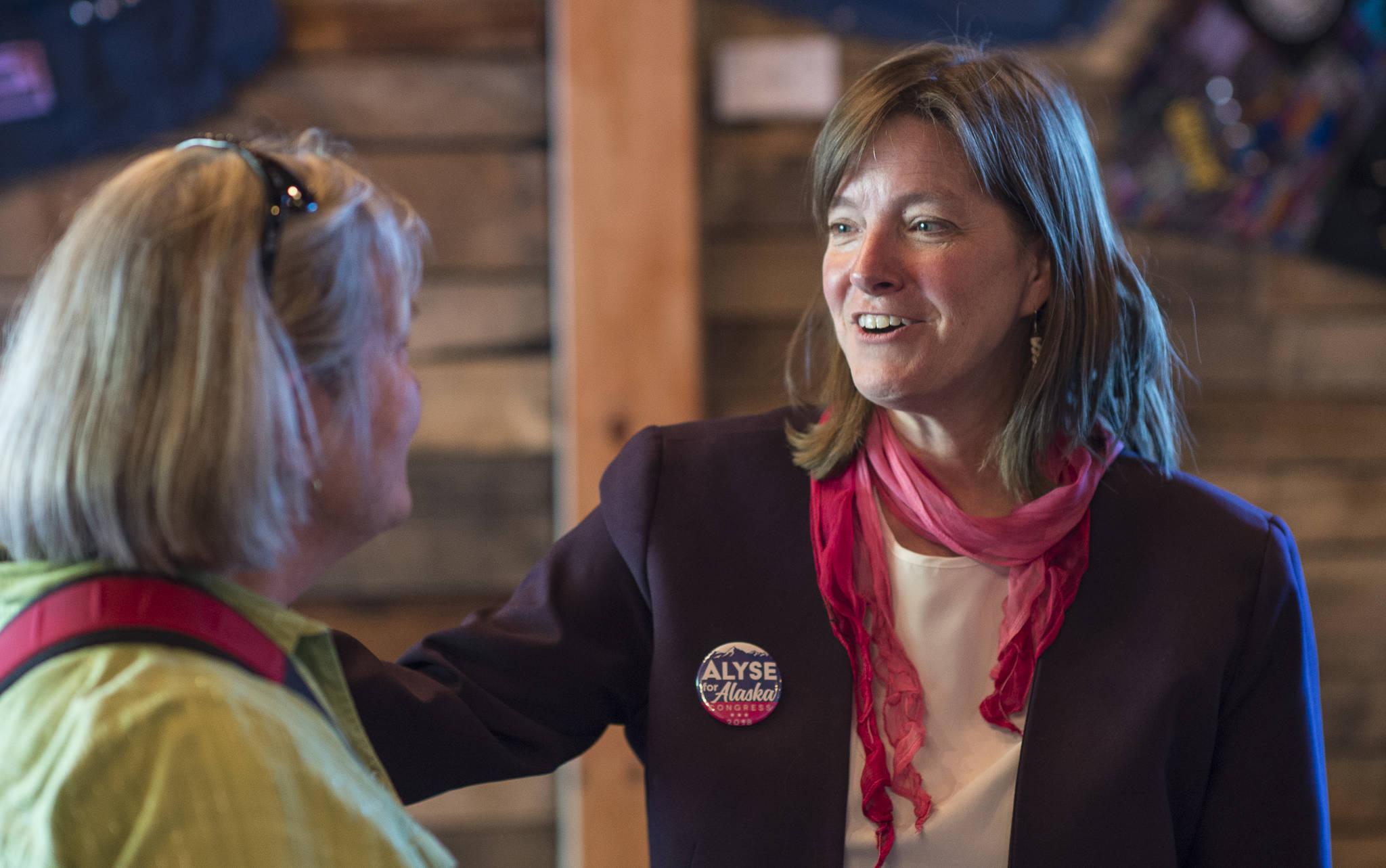 Michael Penn | Juneau Empire                                Alyse Galvin, indpendent candidate for U.S. House of Representatives, right, speaks with Marilyn Orr during a “town-hall-style coffee and conversation” at 60 Degrees North Coffee and Tea on Sept. 14, 2018. Galvin is running against Republican incumbent Rep. Don Young.