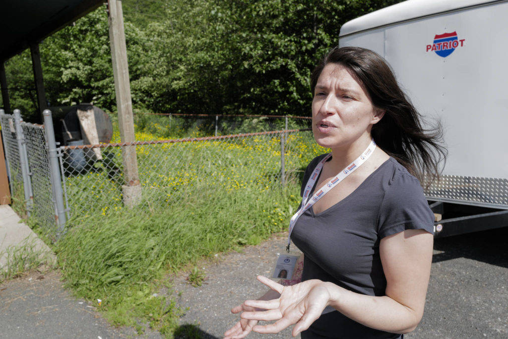 Jennifer Canfield, co-owner of marijuana retailer Green Elephant, talks on Monday, June 24, 2019, about how the company might turn its backyard into an onsite consumption garden if given permission by the city. (Michael Penn | Juneau Empire)