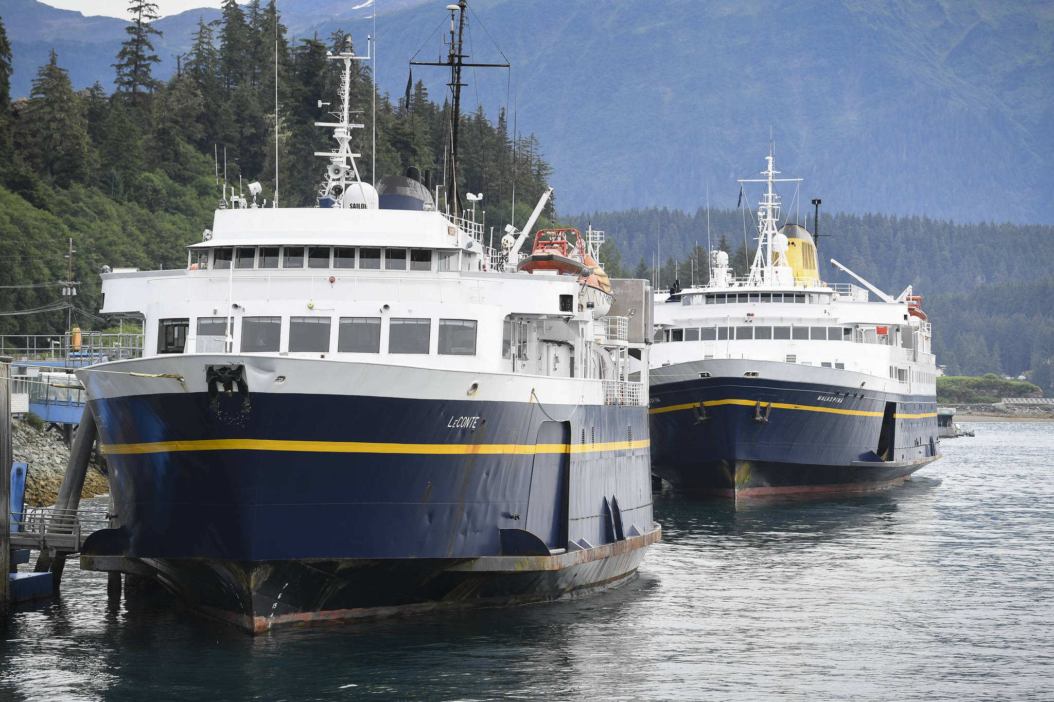 The Alaska Marine Highway System ferries LeConte, left, Malaspina and Tazlina, hidden from view, are tied up at the Auke Bay Terminal on Thursday, July 25, 2019. The Inland Boatmen’s Union of the Pacific called a strike on Wednesday over failed negotiations with Gov. Mike Dunleavy’s administration. (Michael Penn | Juneau Empire)