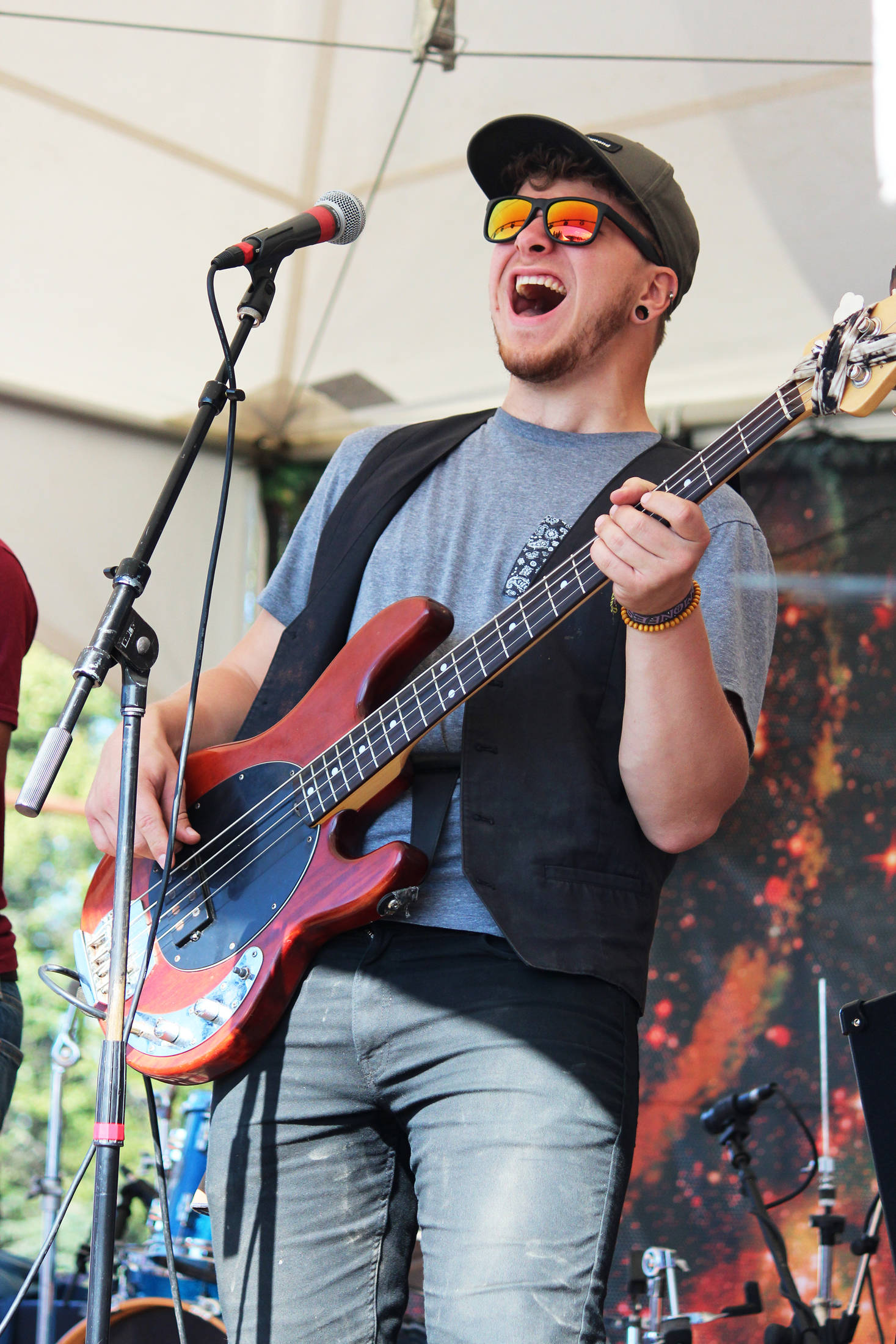 Ben Sayers, bass player for Blackwater Railroad Company, performs with the band on the River Stage on Friday, Aug. 2, 2019 at Salmonfest in Ninilchik, Alaska. (Photo by Megan Pacer/Homer News)