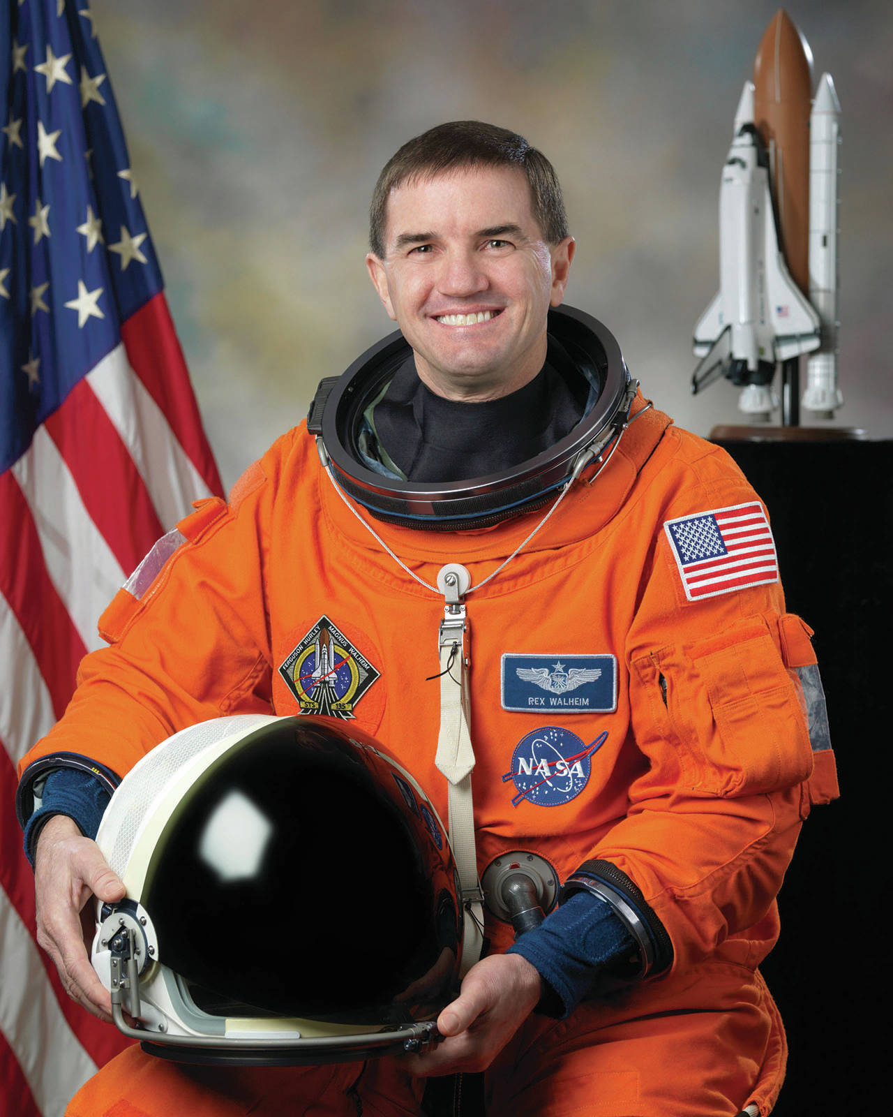 Astronaut Rex Walheim poses for his official Space Shuttle Atlantis STS-135 portrait on Feb. 11, 2011. (Photo by Bill Stafford/NASA)
