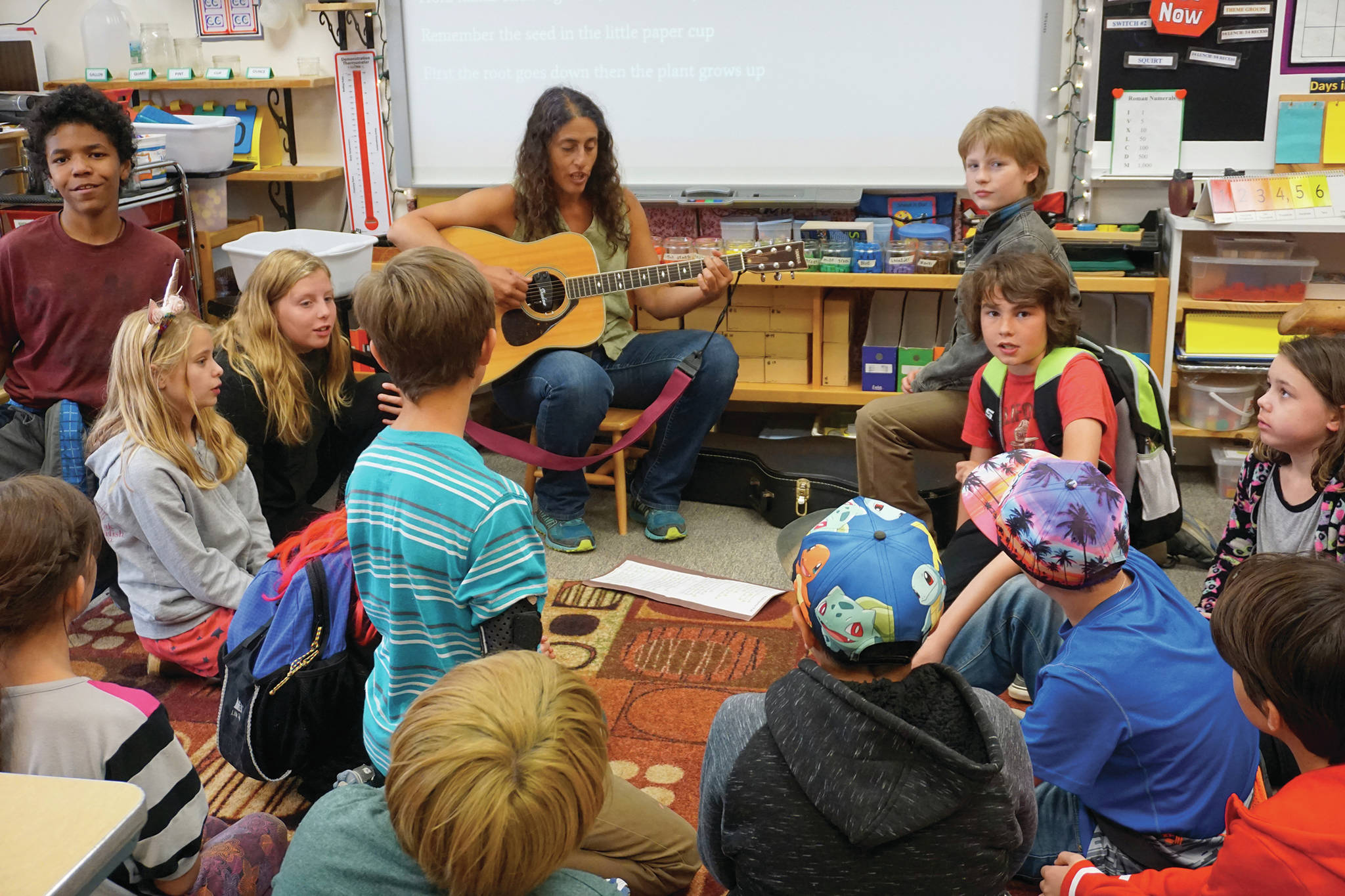 Fireweeed Academy teacher Stephanie Zuniga performs a song for her fifth- and sixth-grade students at the end of the first day of school on Tuesday, Aug. 20, 2019, in Homer, Alaska. (Photo by Michael Armstrong/Homer News)
