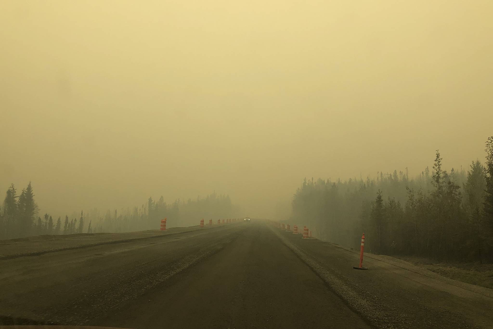 Smoke from the Swan Lake Fire impairs visibility on the Sterling Highway on Aug. 20, 2019. (Photo by Victoria Petersen/Peninsula Clarion)