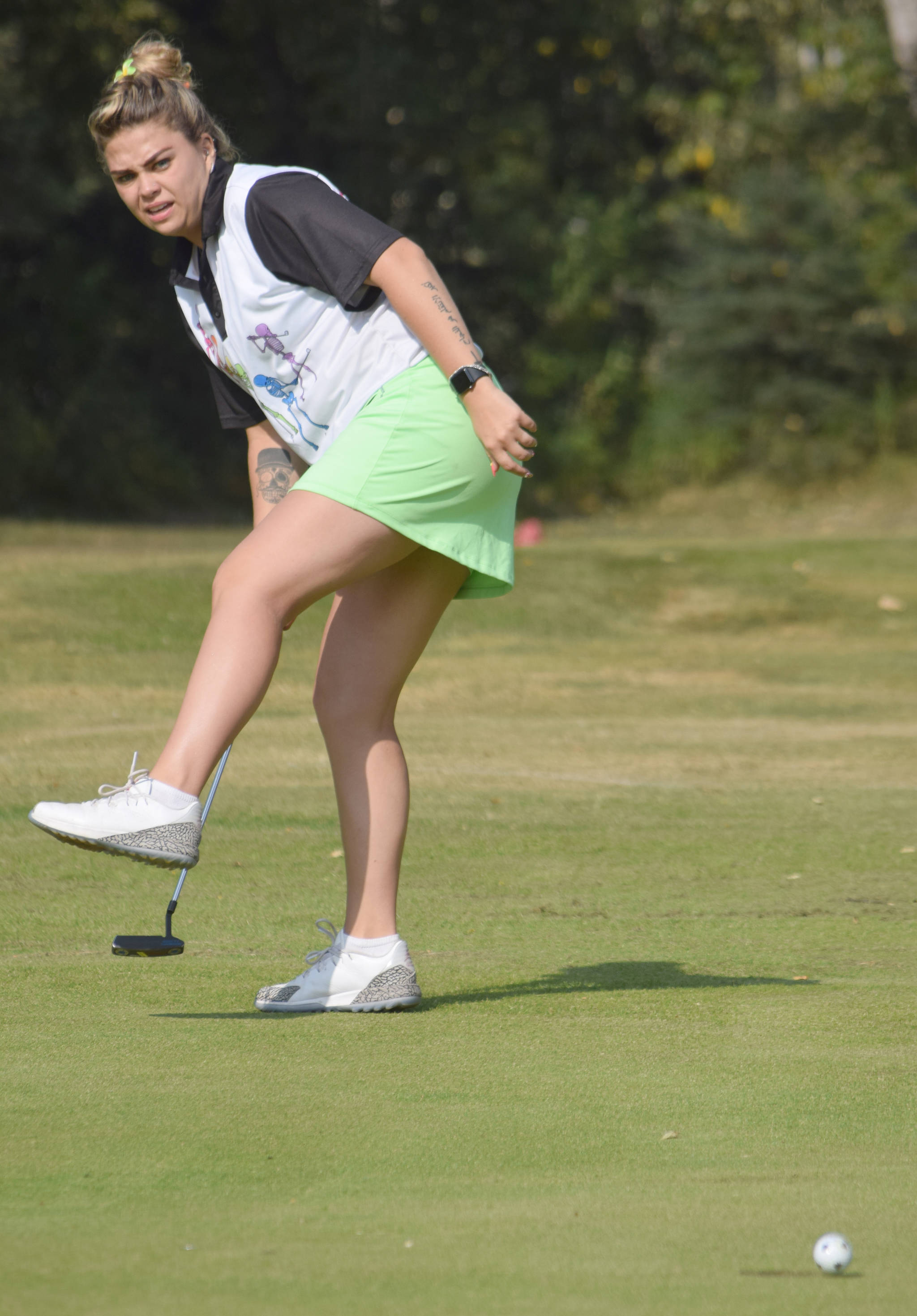 Halcyon Swisher, of Anchorage, reacts as her putt on No. 18 just misses Sunday, Aug. 25, 2019, during the Kenai Peninsula Open at Birch Ridge Golf Course in Soldotna, Alaska. (Photo by Jeff Helminiak/Peninsula Clarion)