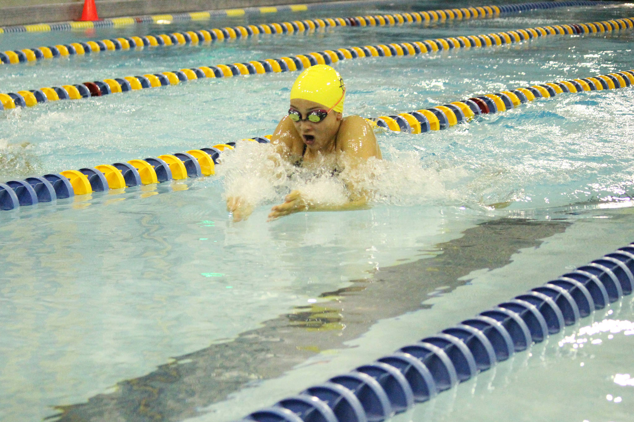 Homer’s Madison Story swims to first place in the girls 100 yard breaststroke during the Homer Invitational on Saturday, Sept. 7, 2019 at the Kate Kuhns Aquatic Center in Homer, Alaska. (Photo by Megan Pacer/Homer News)