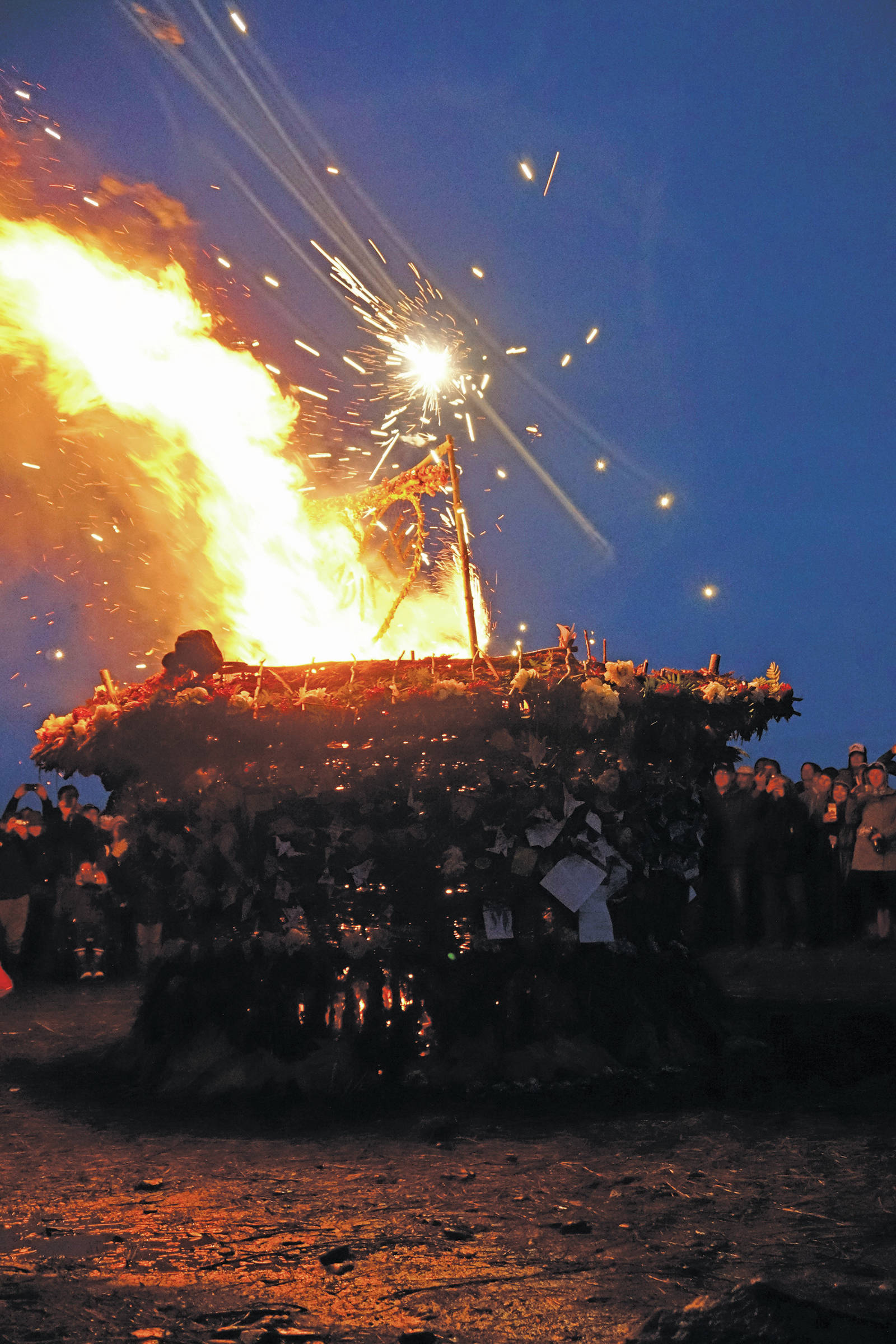 “Radiate,” the 16th annual Burning Basket, catches fire Sunday night, Sept. 15, 2019, at Mariner Park on the Homer Spit in Homer, Alaska. (Photo by Michael Armstrong/Homer News)